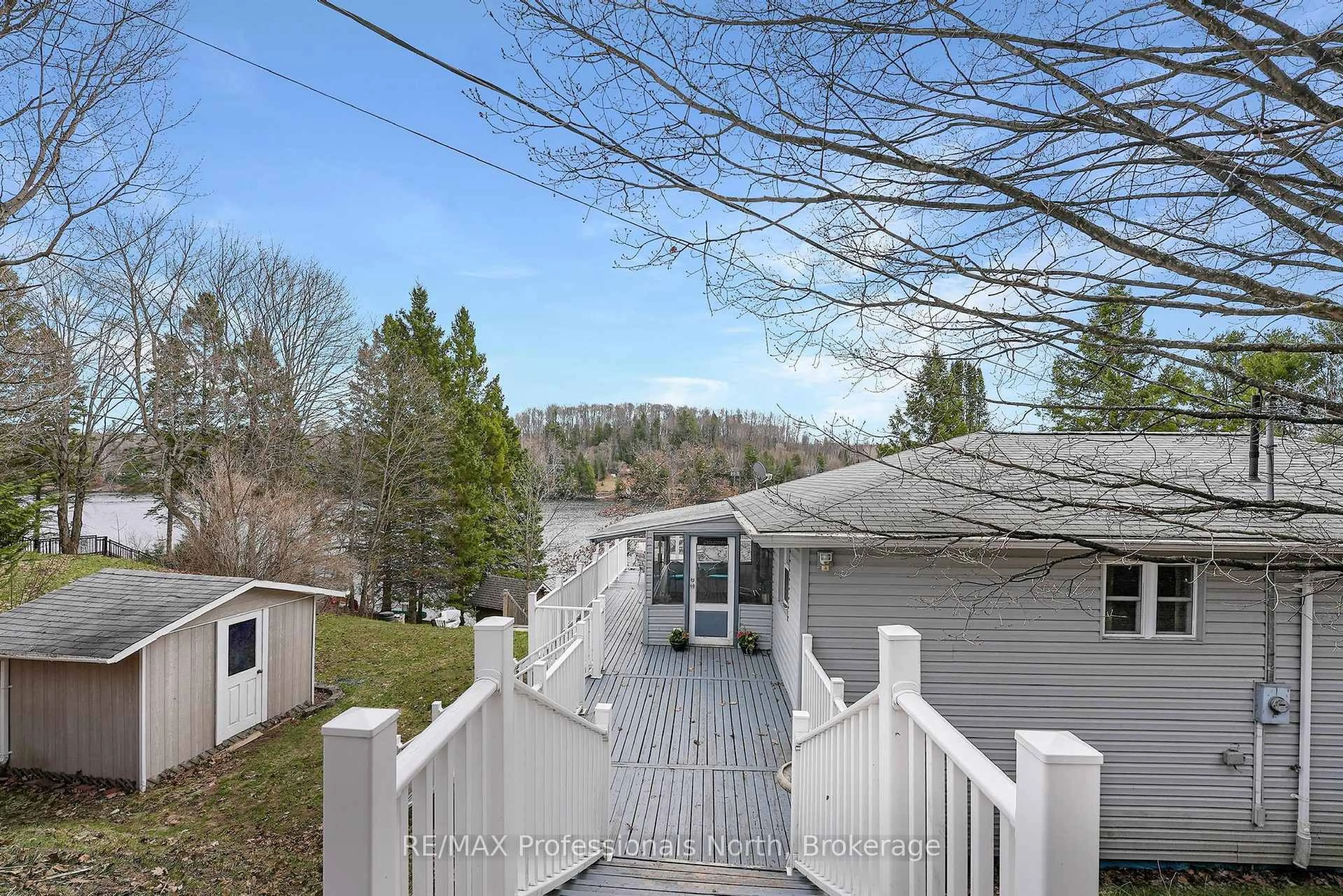 A pic from outside/outdoor area/front of a property/back of a property/a pic from drone, mountain view for 1103 Summer Lane, Minden Hills Ontario K0M 2K0