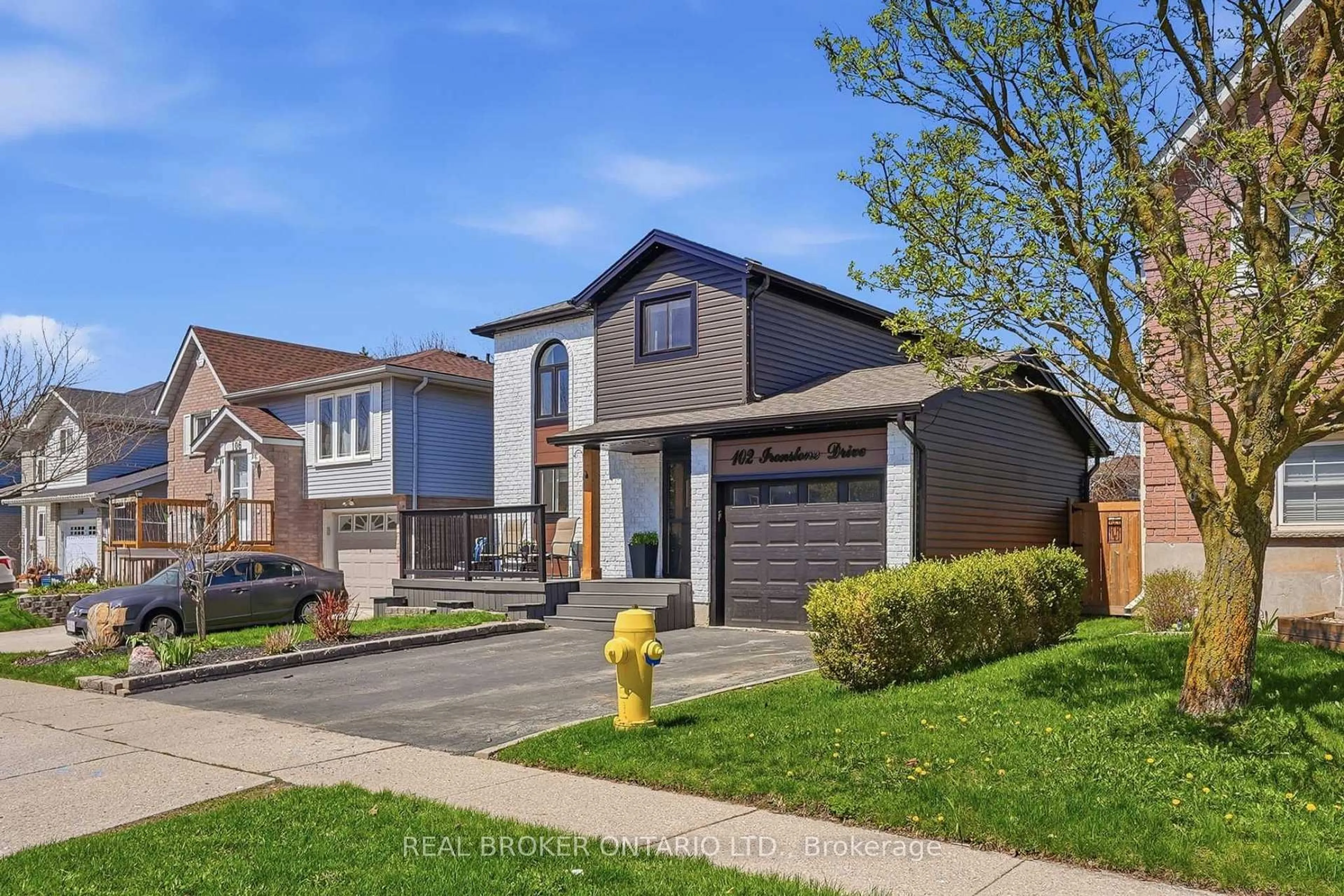 Home with brick exterior material, street for 102 Ironstone Dr, Cambridge Ontario N1P 1A4