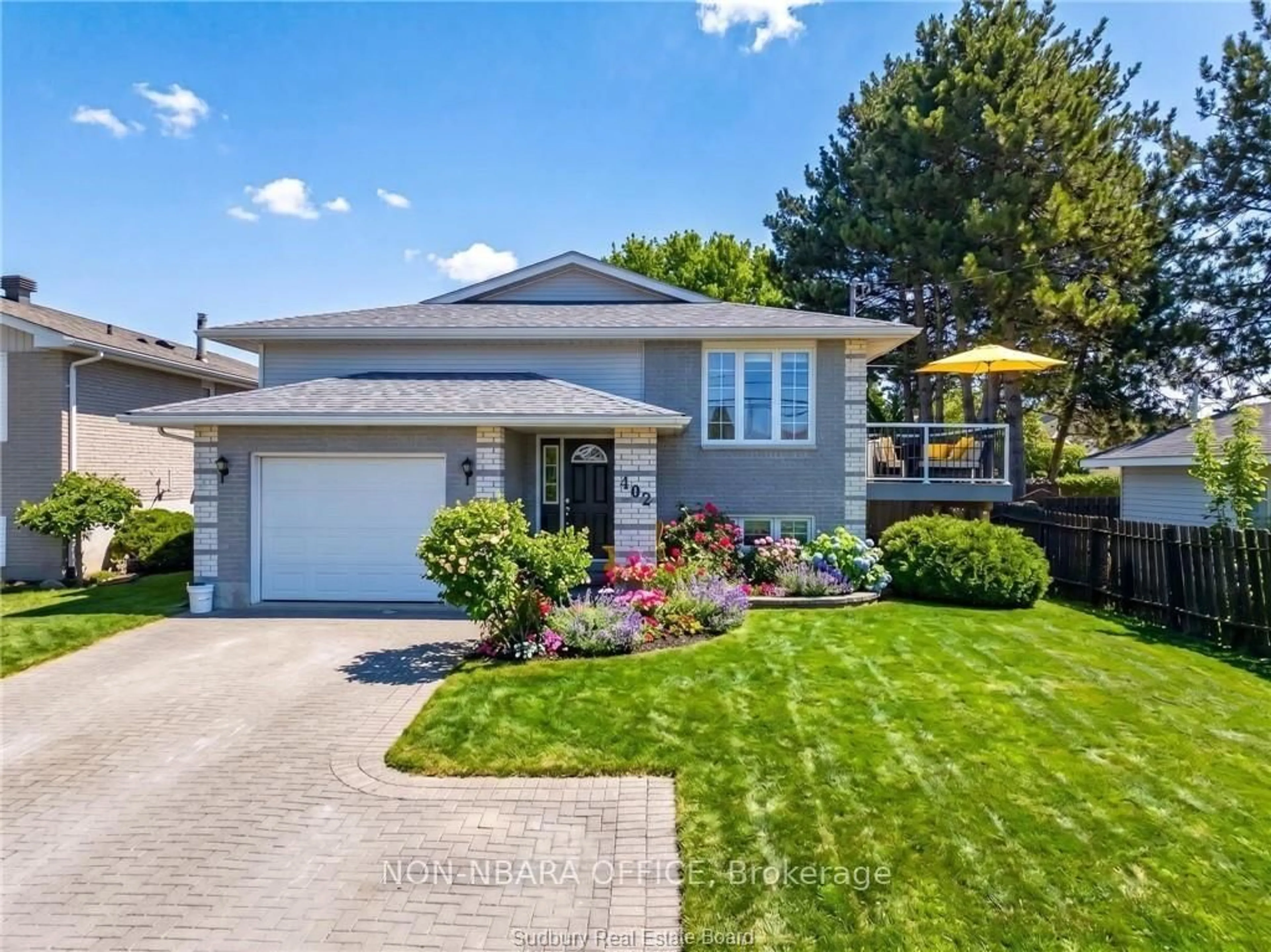 Home with vinyl exterior material, street for 402 Levesque St, West Nipissing Ontario P2B 3E4