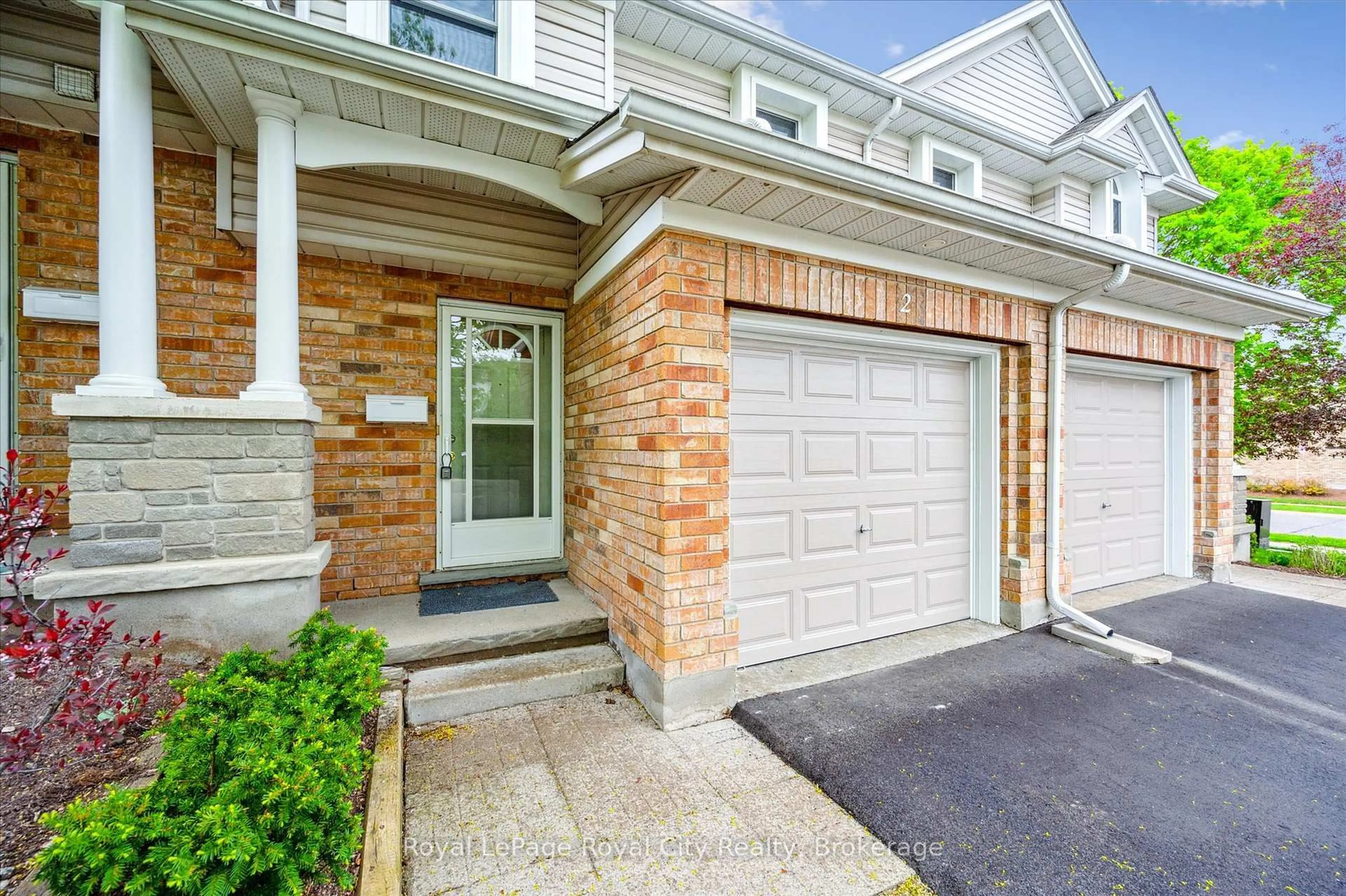 Home with brick exterior material, street for 66 Rodgers Rd #2, Guelph Ontario N1G 4Y5