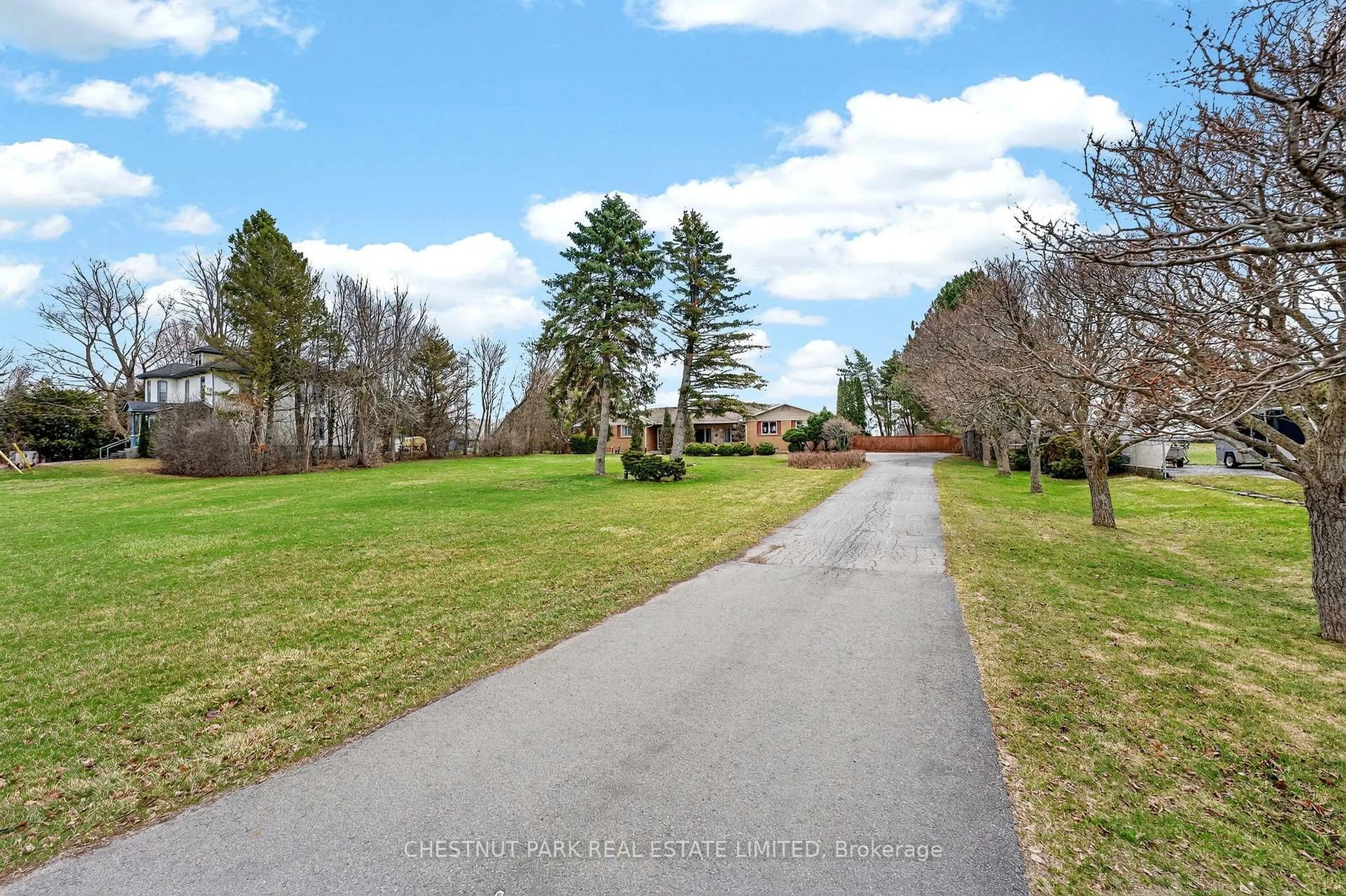 A pic from outside/outdoor area/front of a property/back of a property/a pic from drone, unknown for 729 County Road 3, Prince Edward County Ontario K8N 4Z1