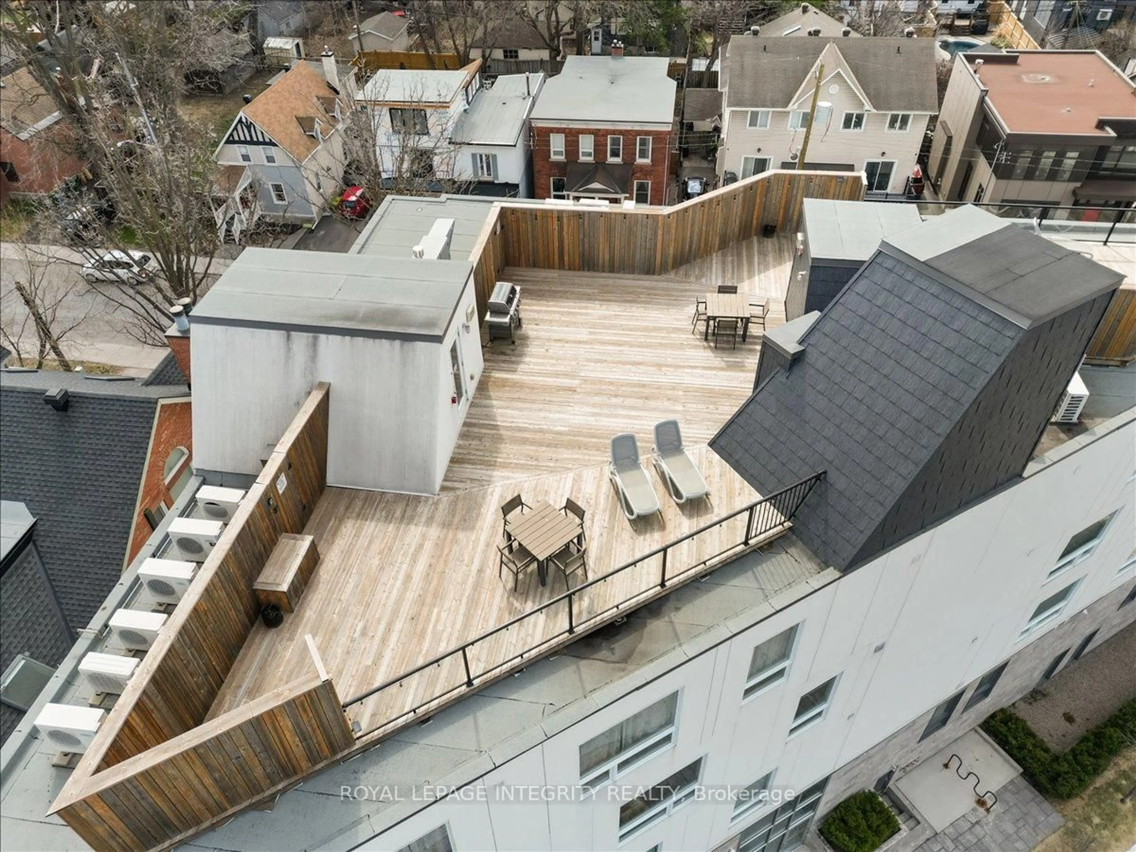 A pic from outside/outdoor area/front of a property/back of a property/a pic from drone, city buildings view from balcony for 150 Greenfield Ave #204, Ottawa Ontario K1S 0X8