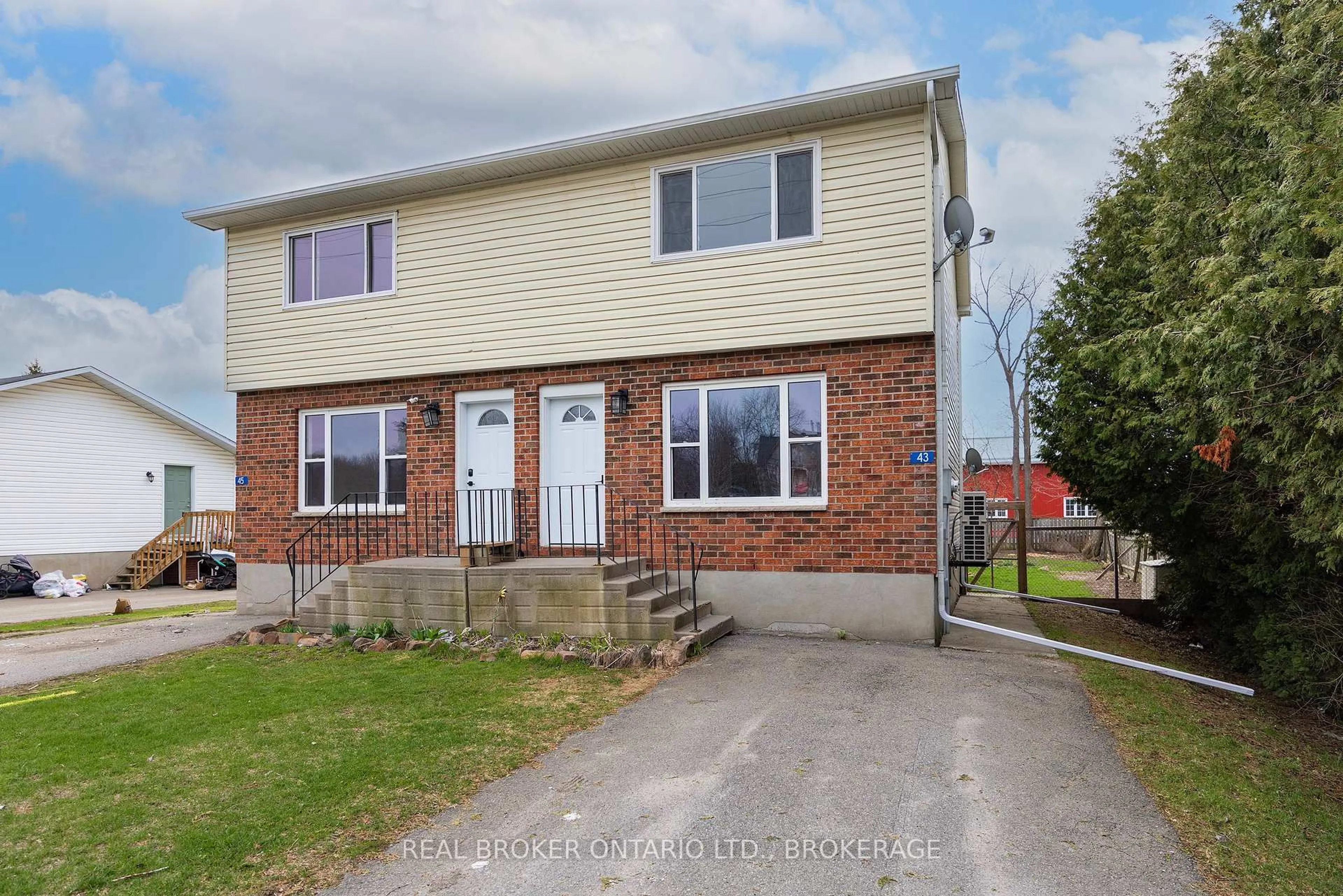 A pic from outside/outdoor area/front of a property/back of a property/a pic from drone, street for 43-45 Railway St, Lansdowne Village Ontario K0E 1L0