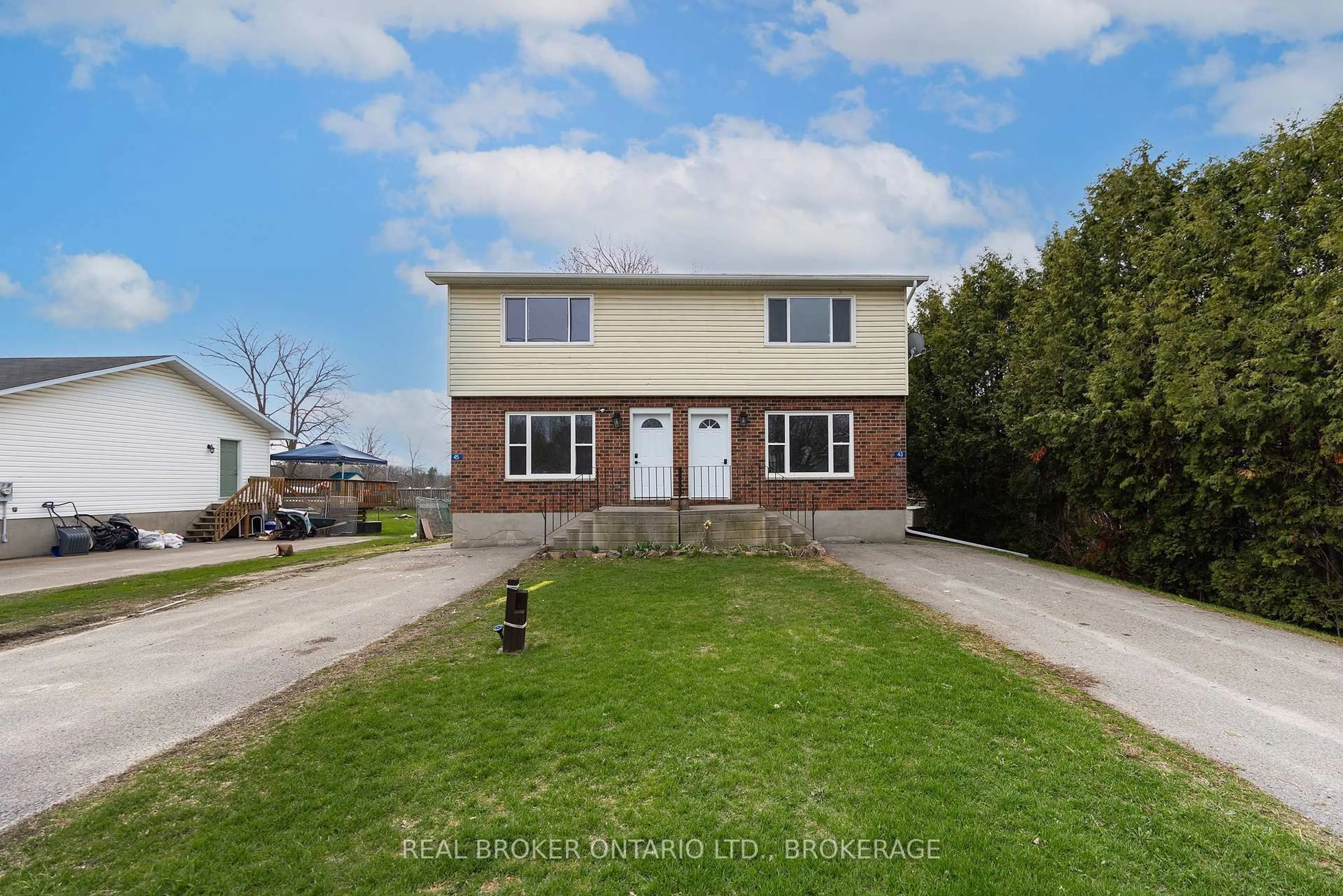 A pic from outside/outdoor area/front of a property/back of a property/a pic from drone, street for 43-45 Railway St, Lansdowne Village Ontario K0E 1L0