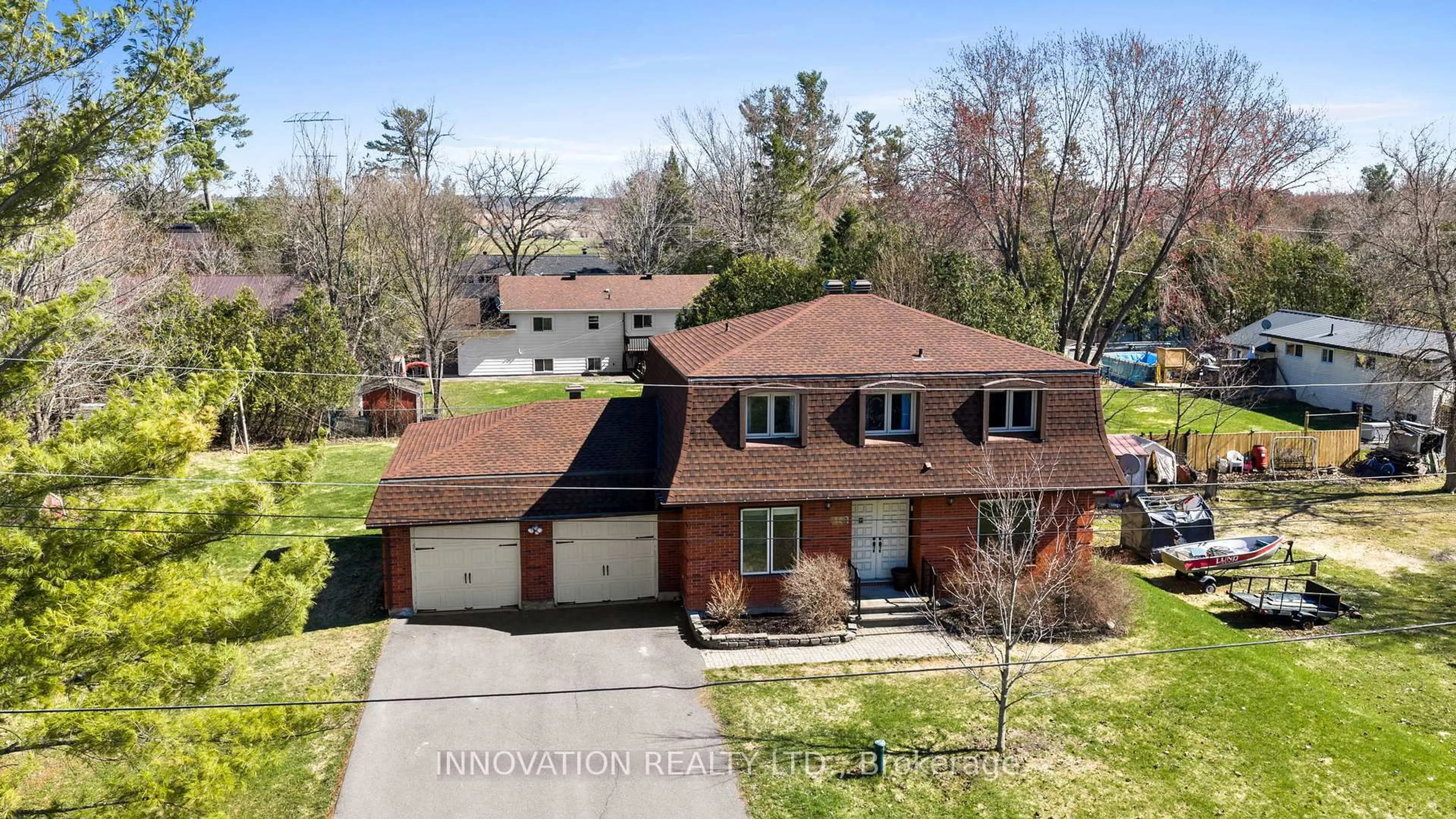A pic from outside/outdoor area/front of a property/back of a property/a pic from drone, street for 114 Poole St, Fitzroy Harbour Ontario K0A 1X0