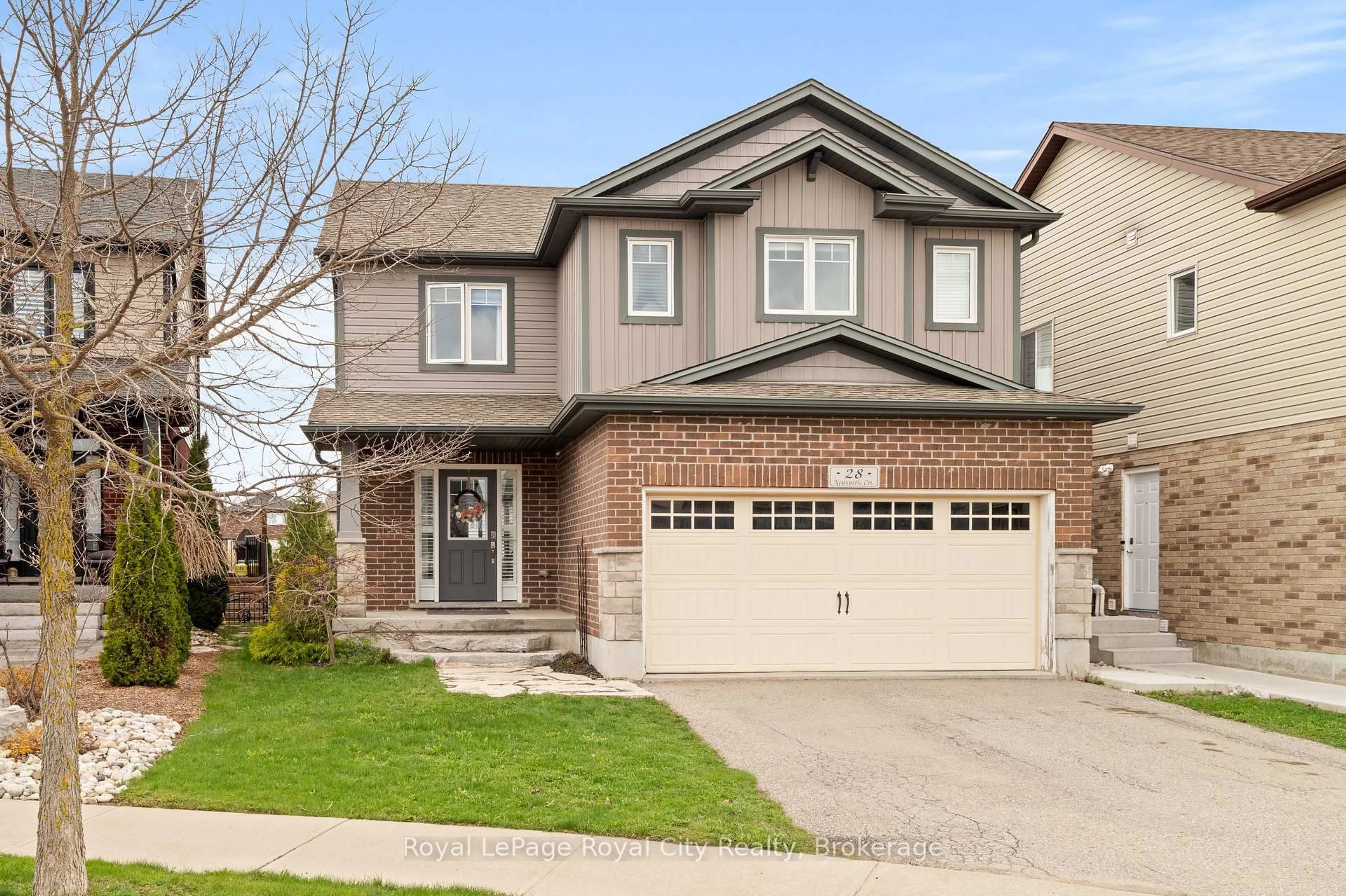 Home with brick exterior material, street for 28 Newcastle Crt, Kitchener Ontario N2R 0G7