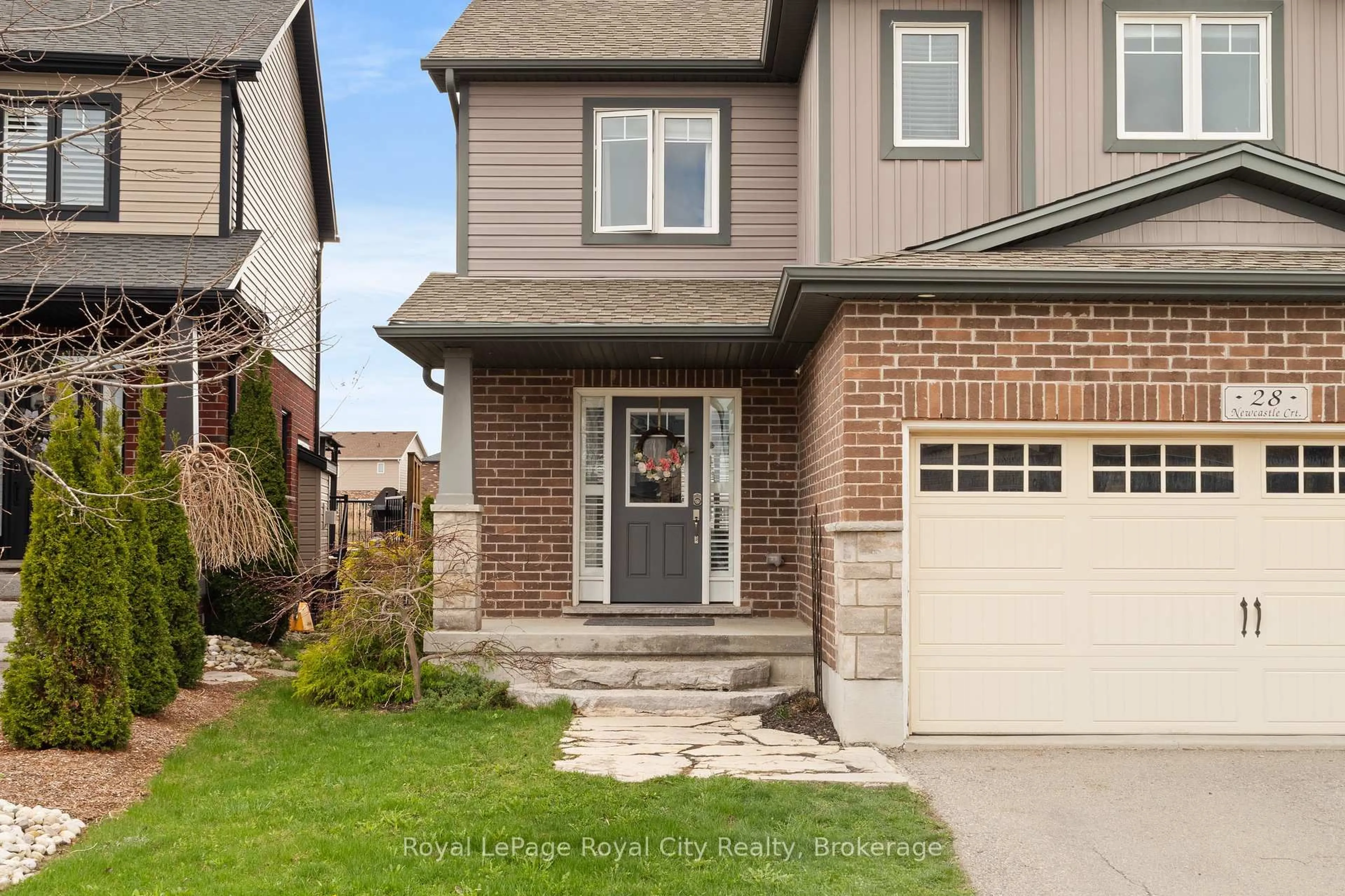 Home with brick exterior material, street for 28 Newcastle Crt, Kitchener Ontario N2R 0G7