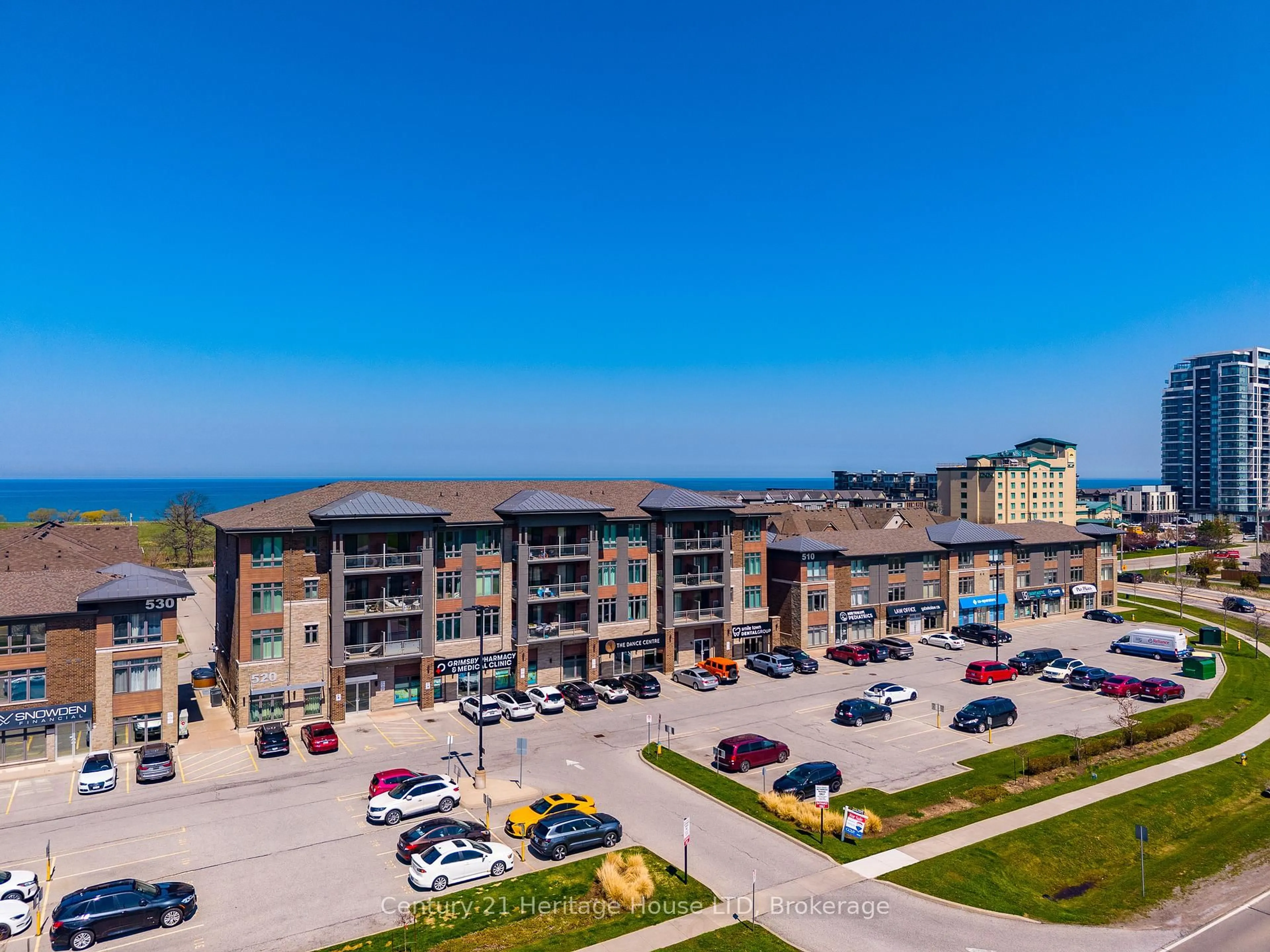 A pic from outside/outdoor area/front of a property/back of a property/a pic from drone, unknown for 520 North Service Rd #402, Grimsby Ontario L3M 0C9