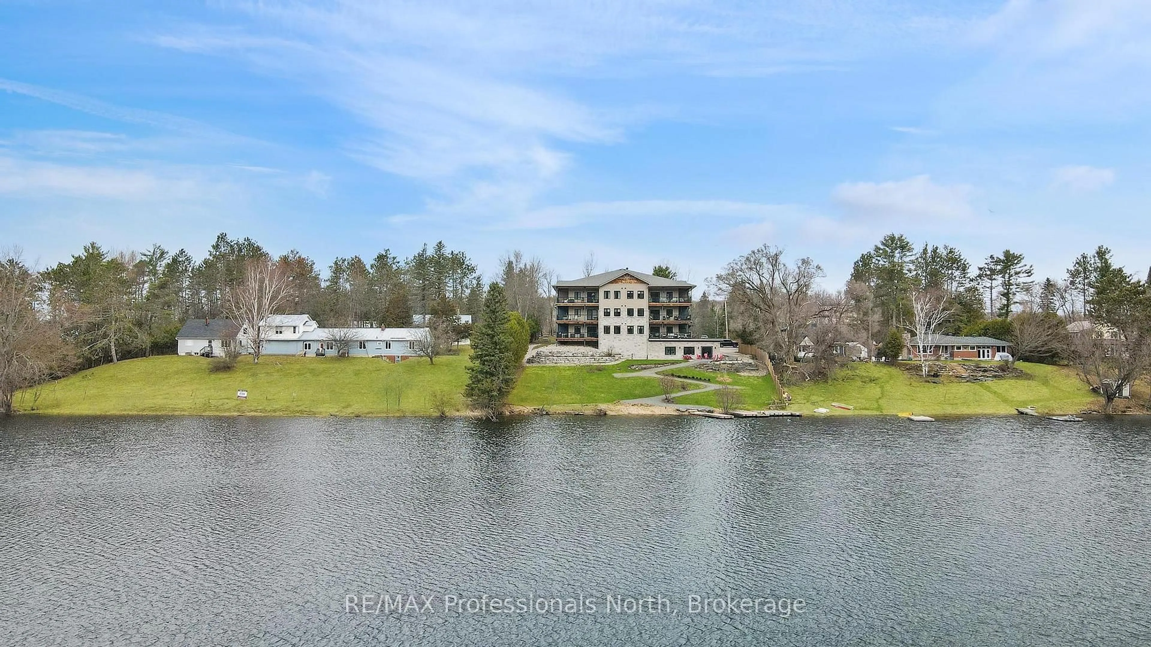 A pic from outside/outdoor area/front of a property/back of a property/a pic from drone, water/lake/river/ocean view for 75 Wallings Rd #201, Dysart et al Ontario K0M 2K0