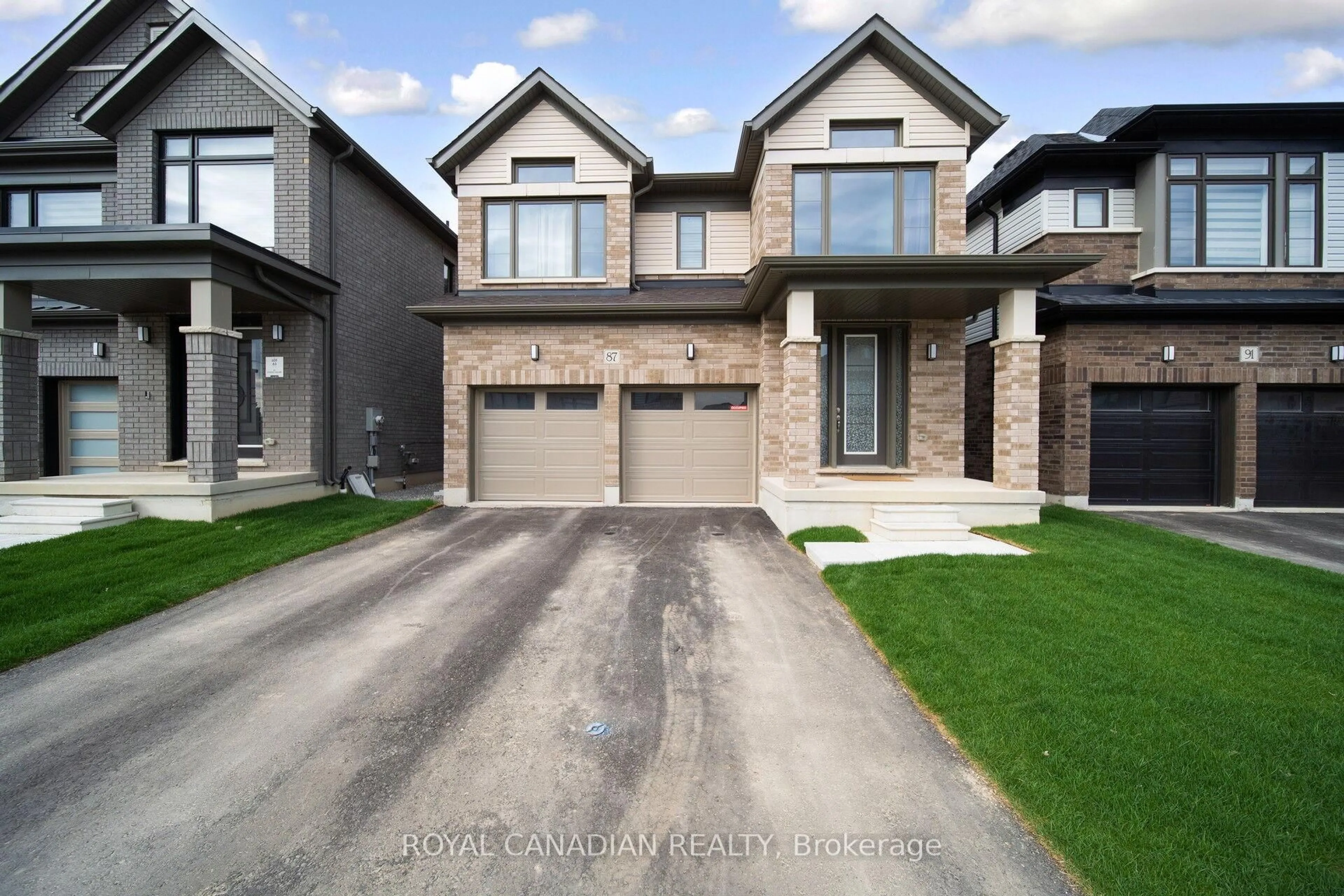 Home with brick exterior material, street for 87 Soules Sq, Hamilton Ontario L0R 1C0