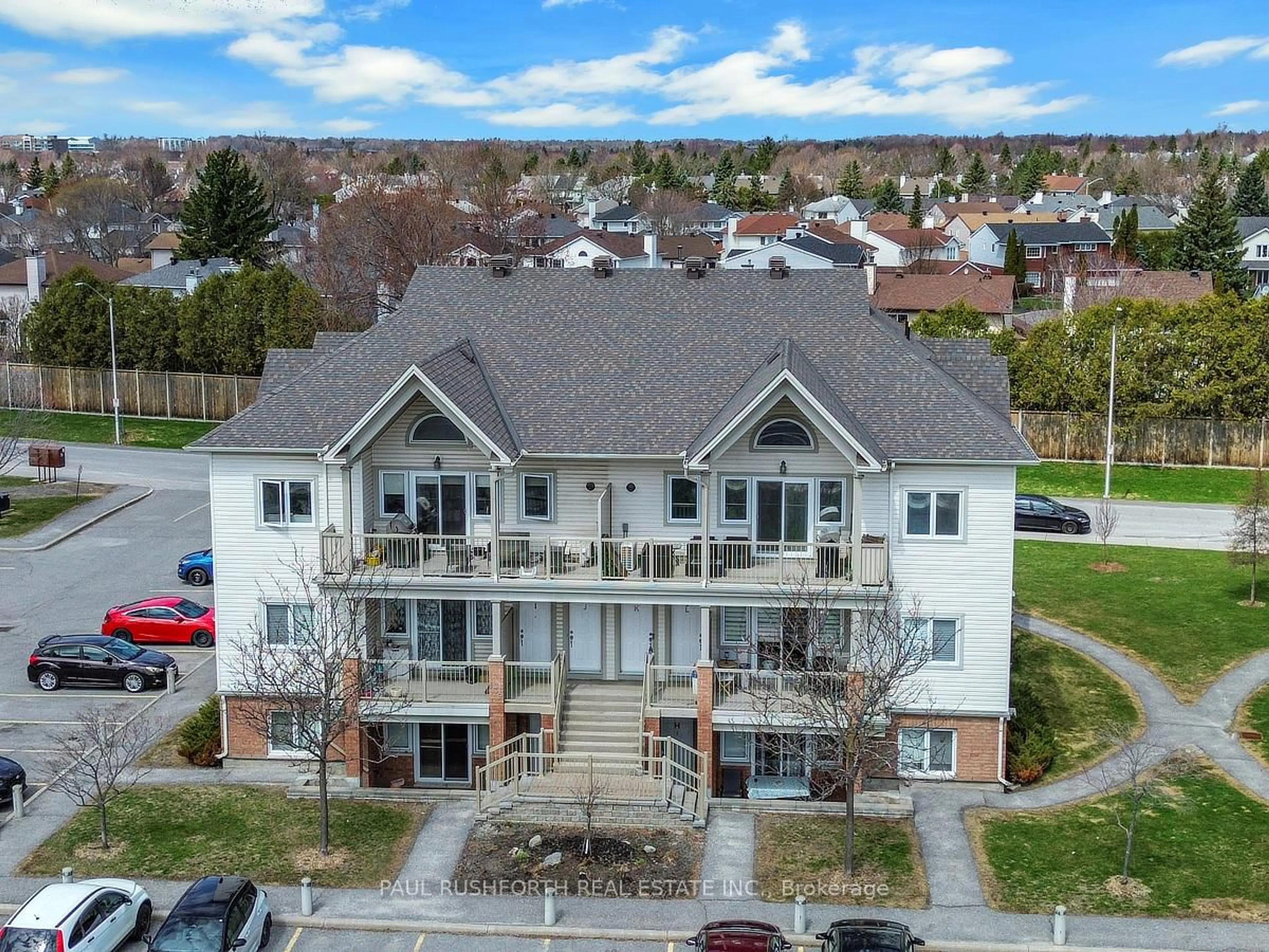 A pic from outside/outdoor area/front of a property/back of a property/a pic from drone, unknown for 137 Harthill Way #L, Ottawa Ontario K2J 5V1