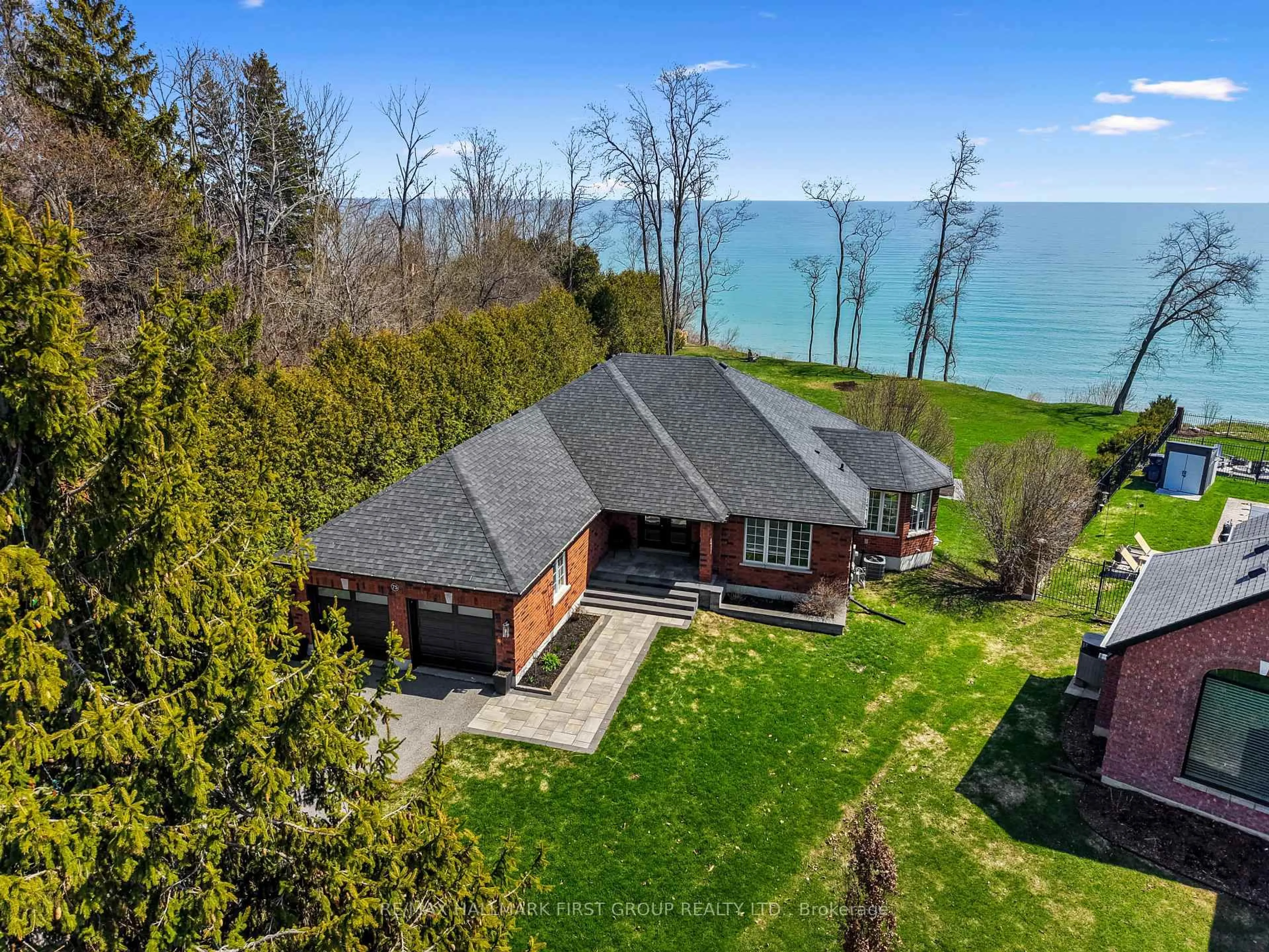 A pic from outside/outdoor area/front of a property/back of a property/a pic from drone, water/lake/river/ocean view for 75 East House Cres, Cobourg Ontario K9A 5K3