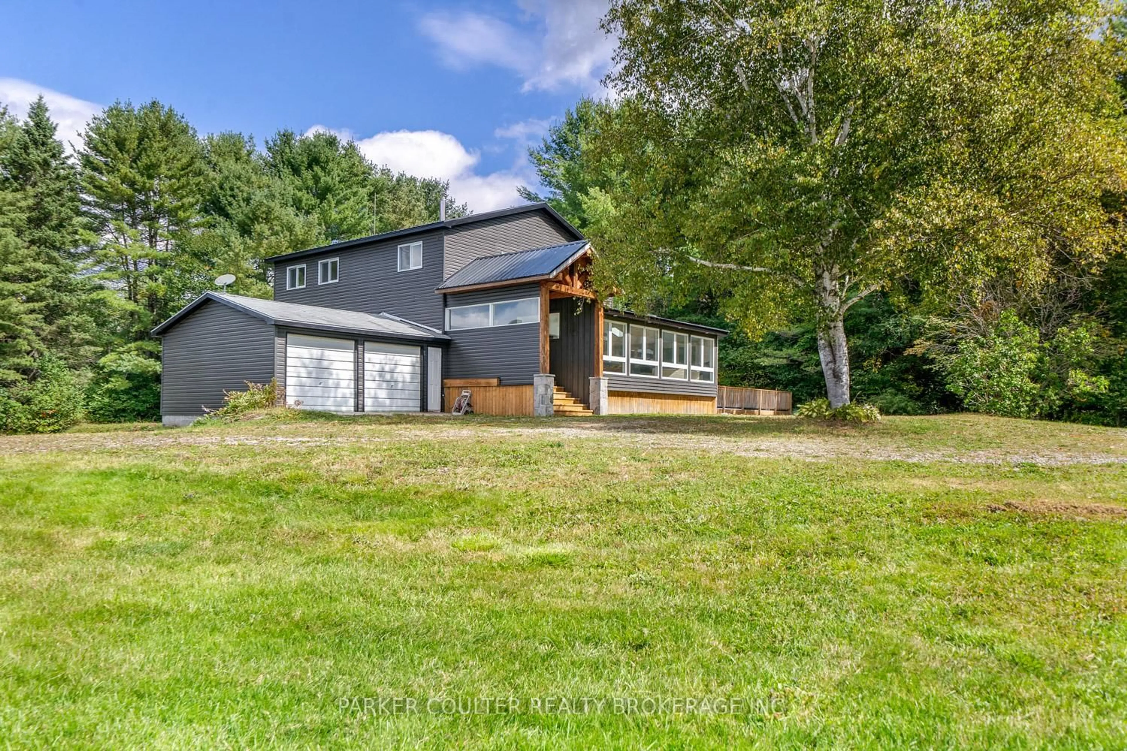 A pic from outside/outdoor area/front of a property/back of a property/a pic from drone, water/lake/river/ocean view for 259 Nippissing Rd, Seguin Ontario P0C 1J0