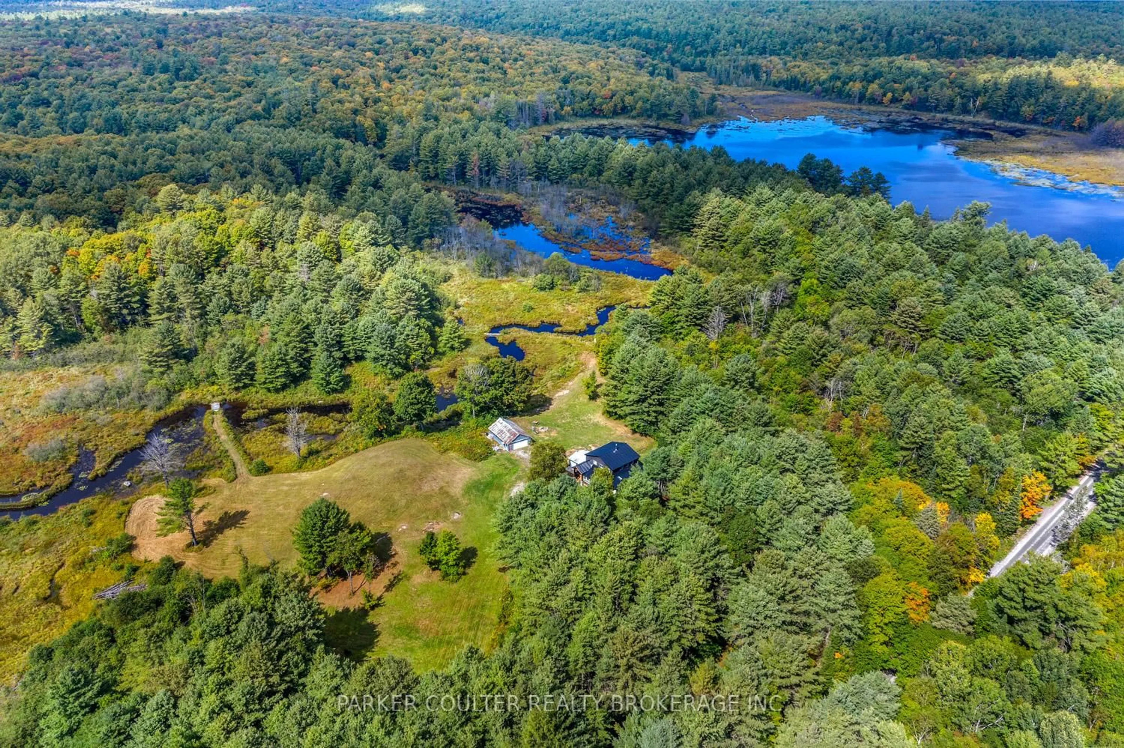 A pic from outside/outdoor area/front of a property/back of a property/a pic from drone, water/lake/river/ocean view for 259 Nippissing Rd, Seguin Ontario P0C 1J0