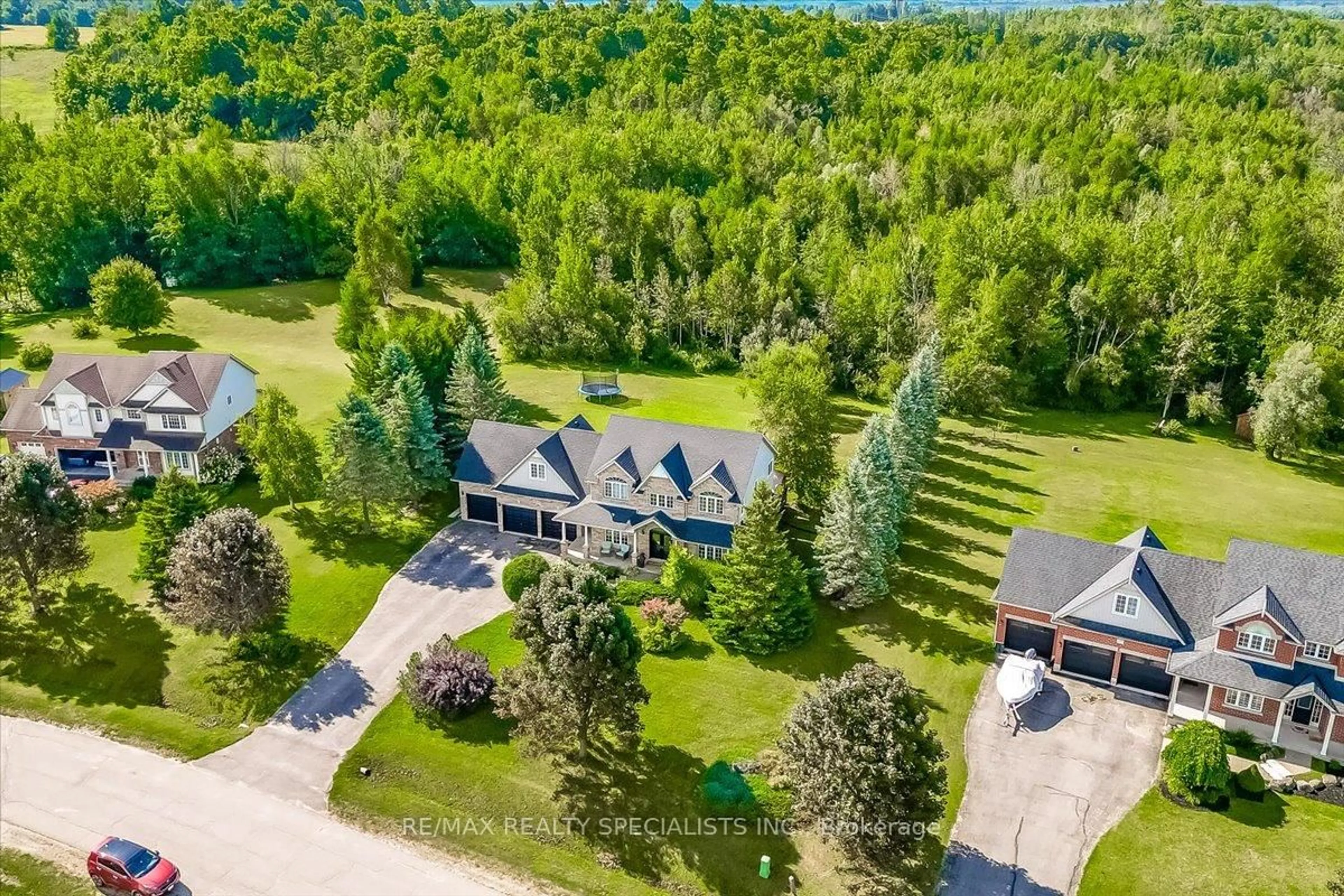 A pic from outside/outdoor area/front of a property/back of a property/a pic from drone, water/lake/river/ocean view for 14 Devonleigh Dr, Amaranth Ontario L0N 1S5