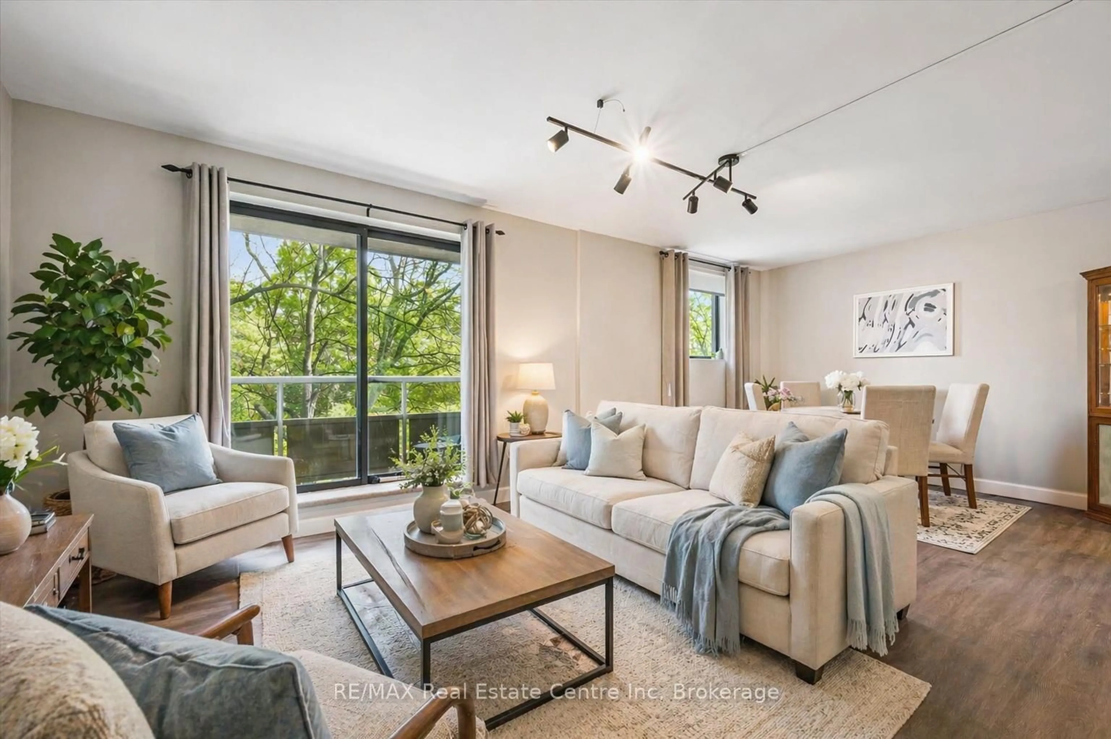 Living room with furniture, unknown for 89 WESTWOOD Rd #302, Guelph Ontario N1H 7J6