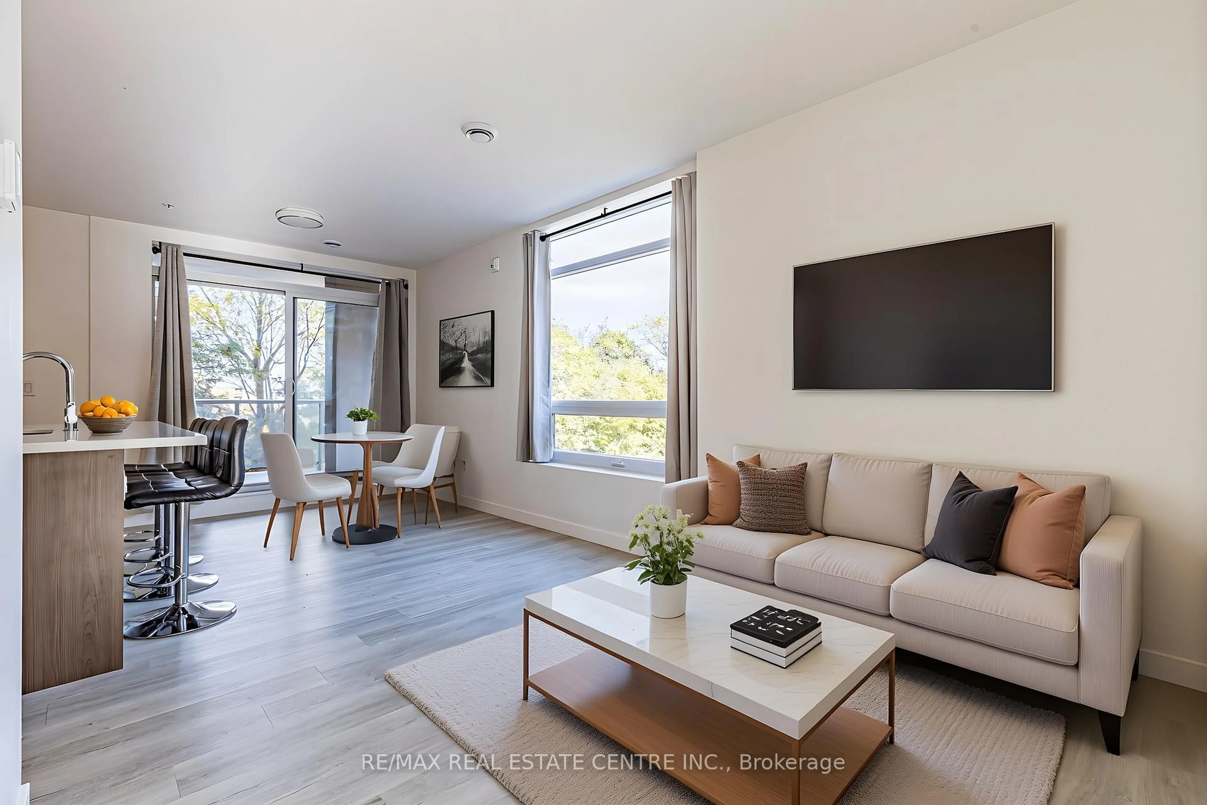 Living room with furniture, unknown for 455 Charlton Ave #208, Hamilton Ontario L8N 0B2