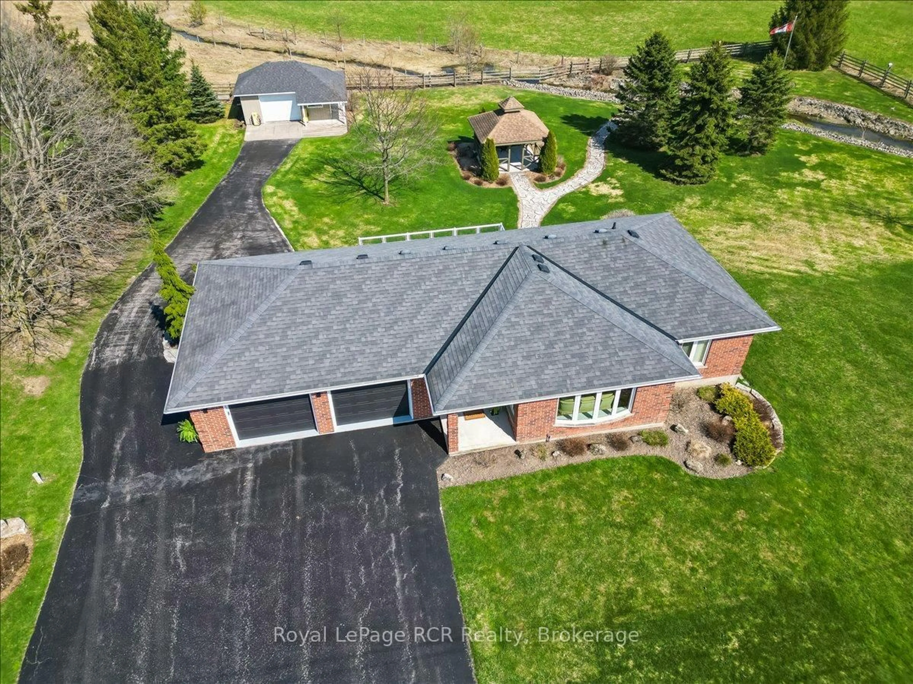 A pic from outside/outdoor area/front of a property/back of a property/a pic from drone, street for 137525 Concession 7 Rd, Georgian Bluffs Ontario N4K 5N5