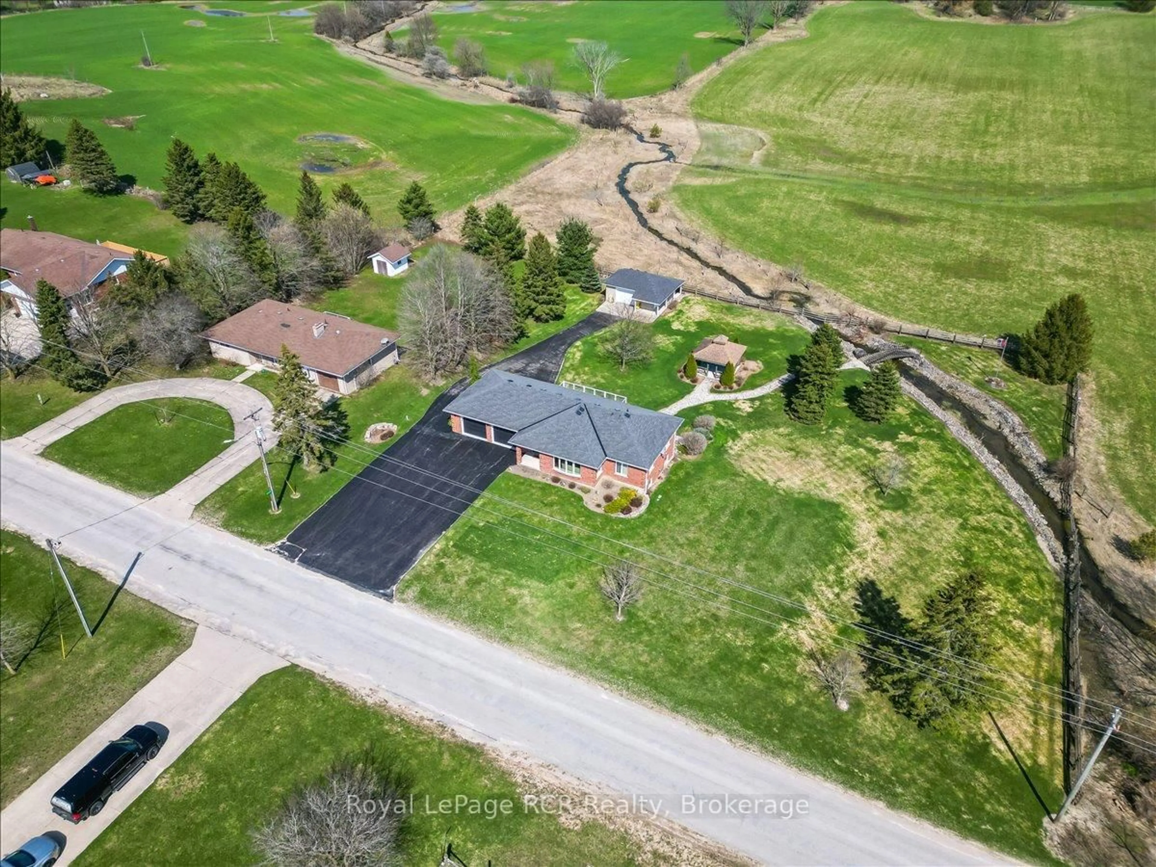 A pic from outside/outdoor area/front of a property/back of a property/a pic from drone, street for 137525 Concession 7 Rd, Georgian Bluffs Ontario N4K 5N5