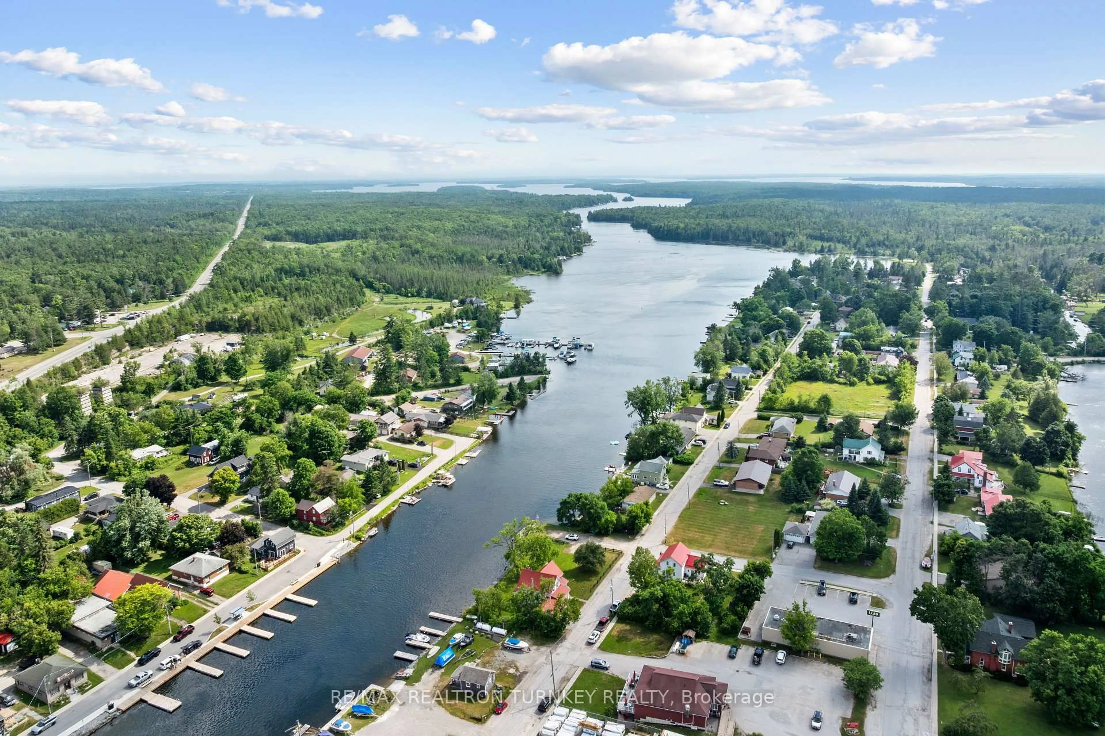 A pic from outside/outdoor area/front of a property/back of a property/a pic from drone, water/lake/river/ocean view for 15 North Water St, Kawartha Lakes Ontario K0M 1K0