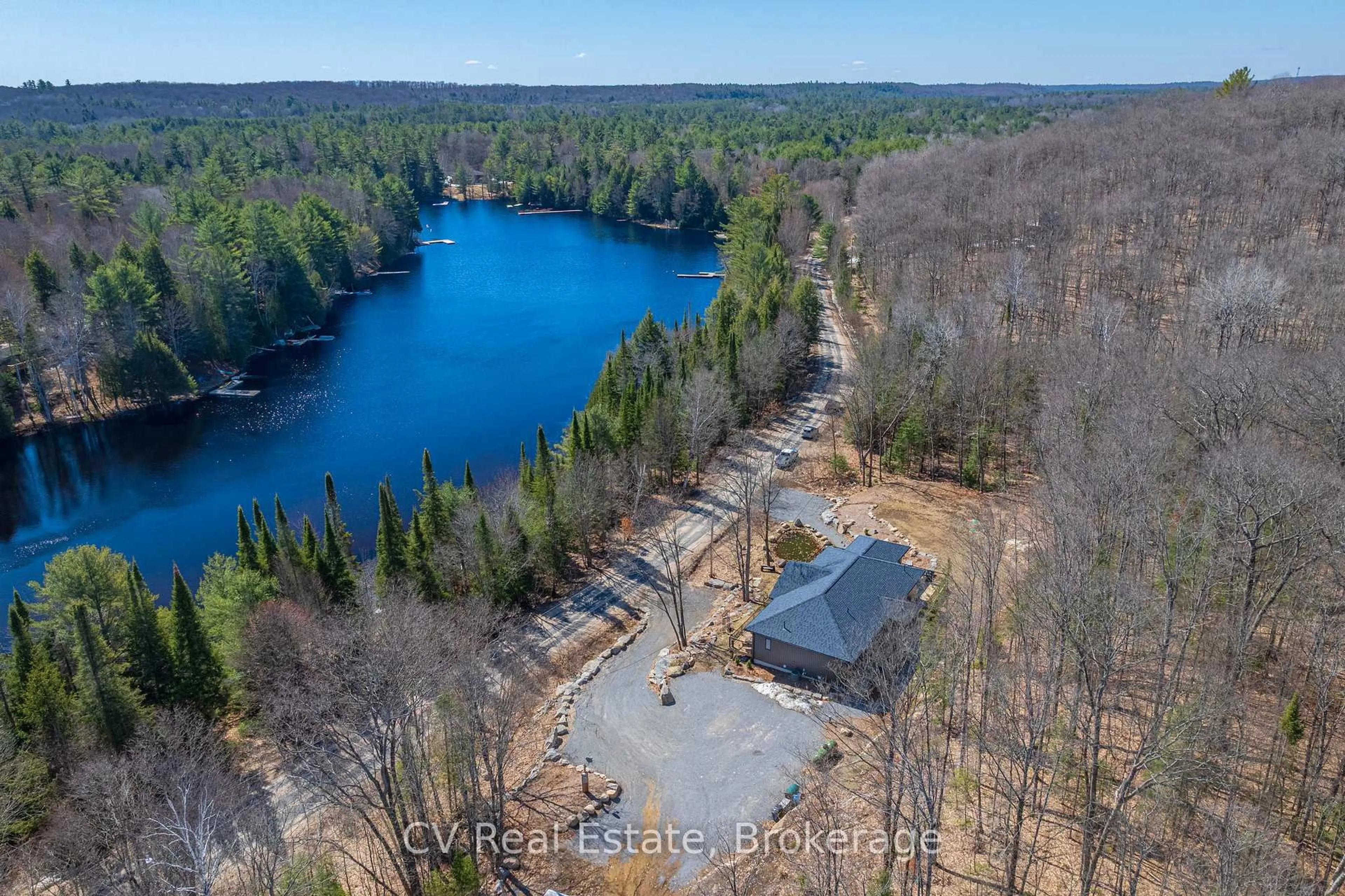 A pic from outside/outdoor area/front of a property/back of a property/a pic from drone, water/lake/river/ocean view for 1203 Burlmarie Rd, Lake of Bays Ontario P0B 1A0