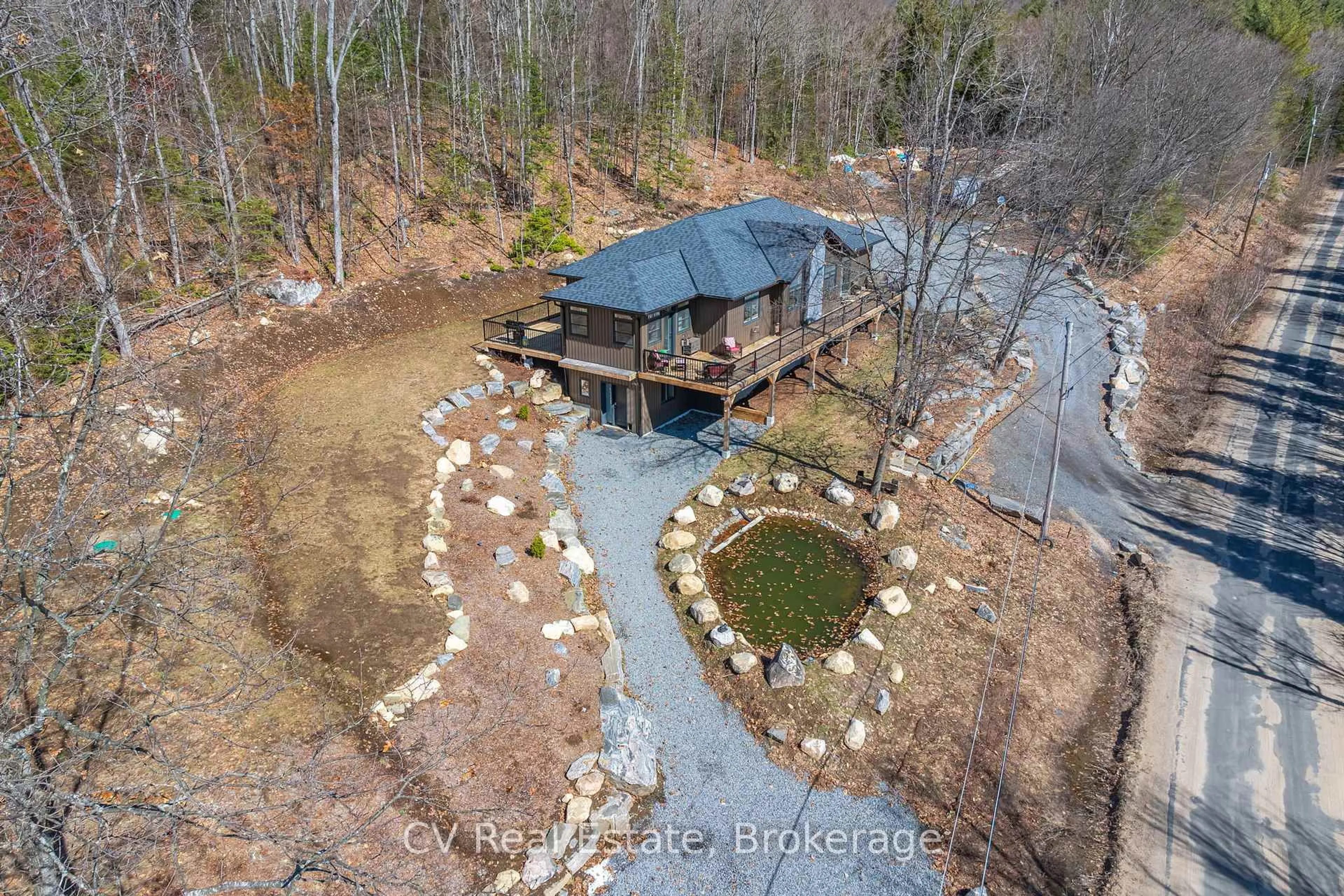 A pic from outside/outdoor area/front of a property/back of a property/a pic from drone, water/lake/river/ocean view for 1203 Burlmarie Rd, Lake of Bays Ontario P0B 1A0