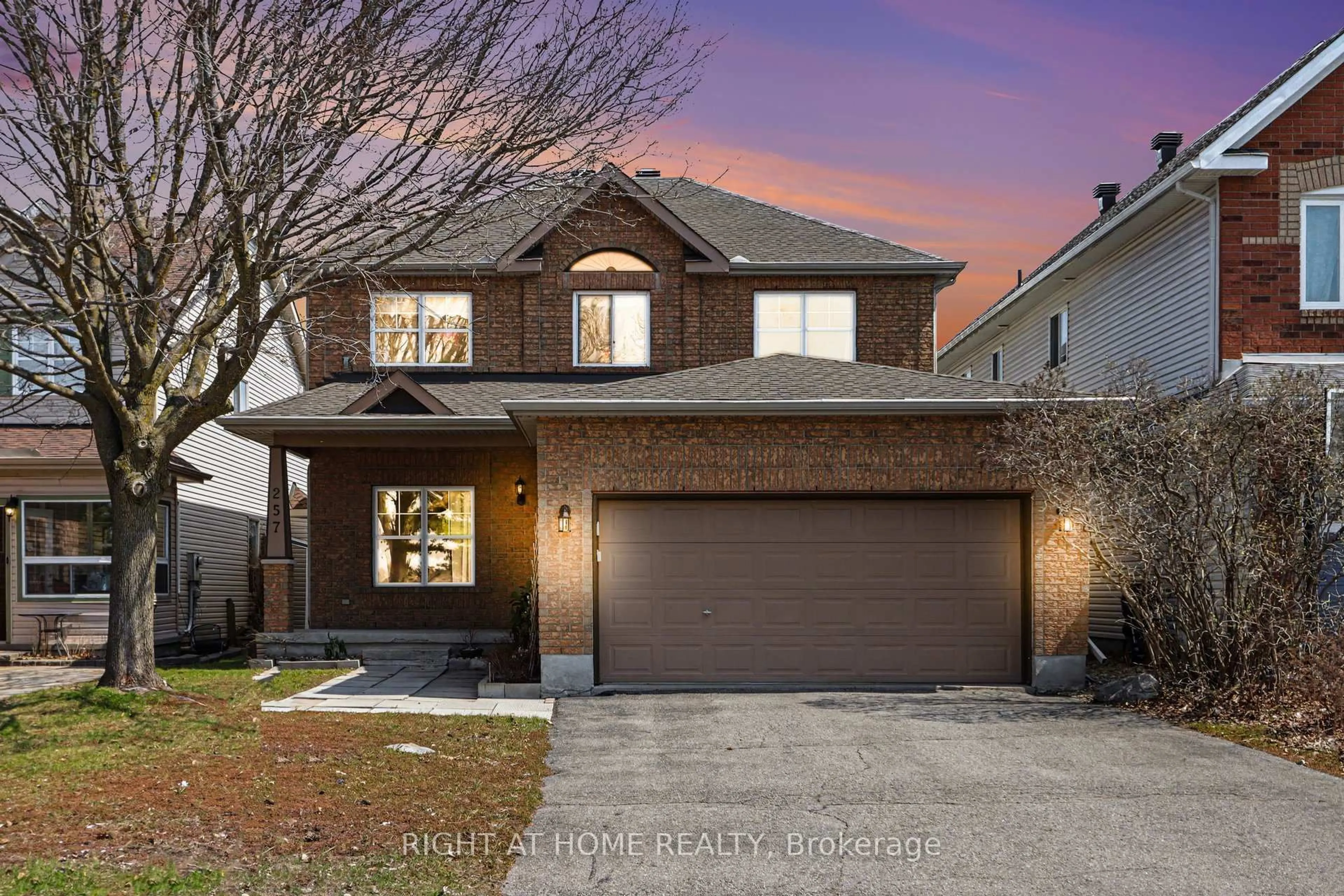 Home with brick exterior material, street for 257 Stoneway Dr, Ottawa Ontario K2G 6E9