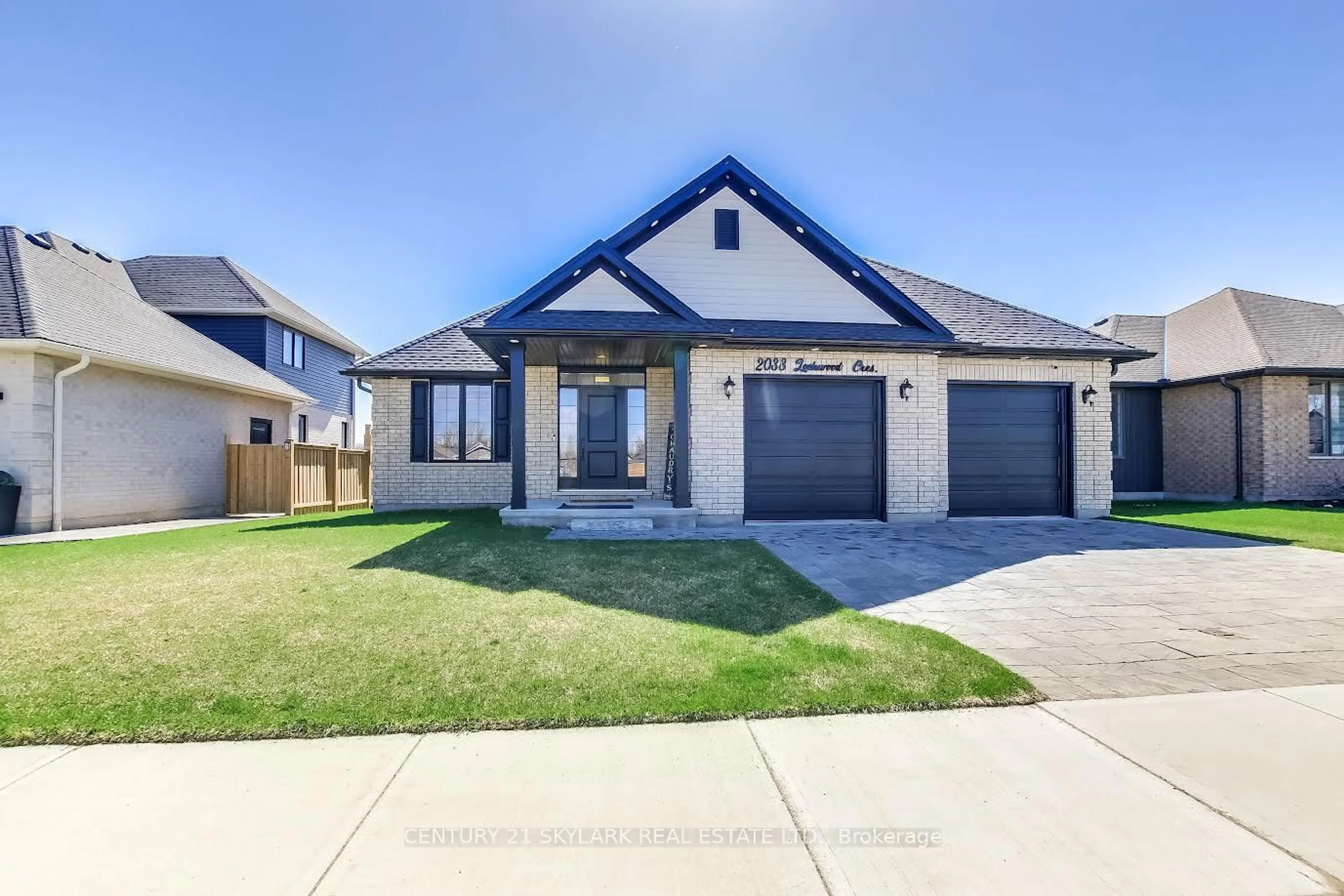 Home with brick exterior material, street for 2033 Lockwood Cres, Strathroy-Caradoc Ontario N0L 1W0