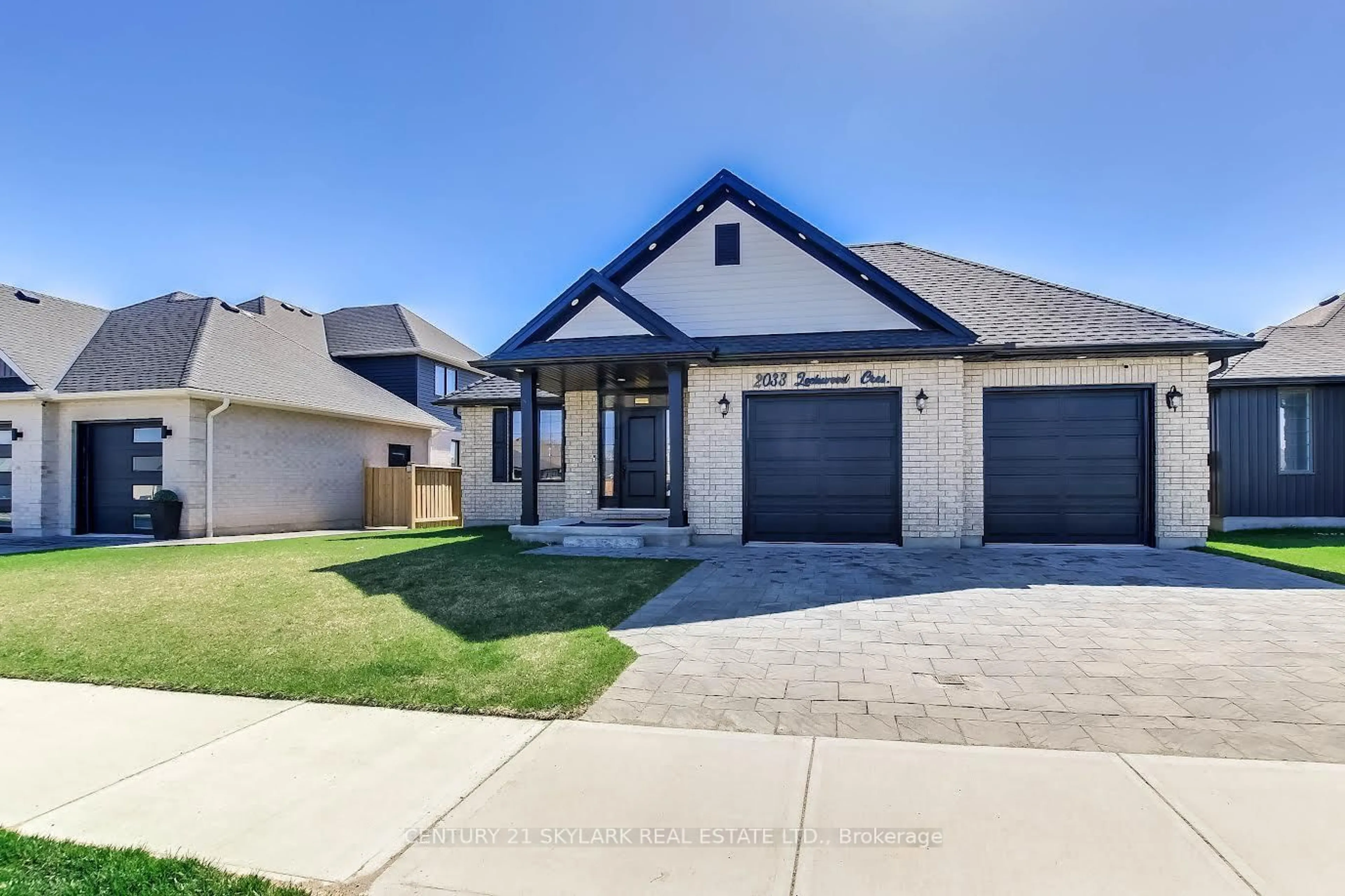 Home with brick exterior material, street for 2033 Lockwood Cres, Strathroy-Caradoc Ontario N0L 1W0