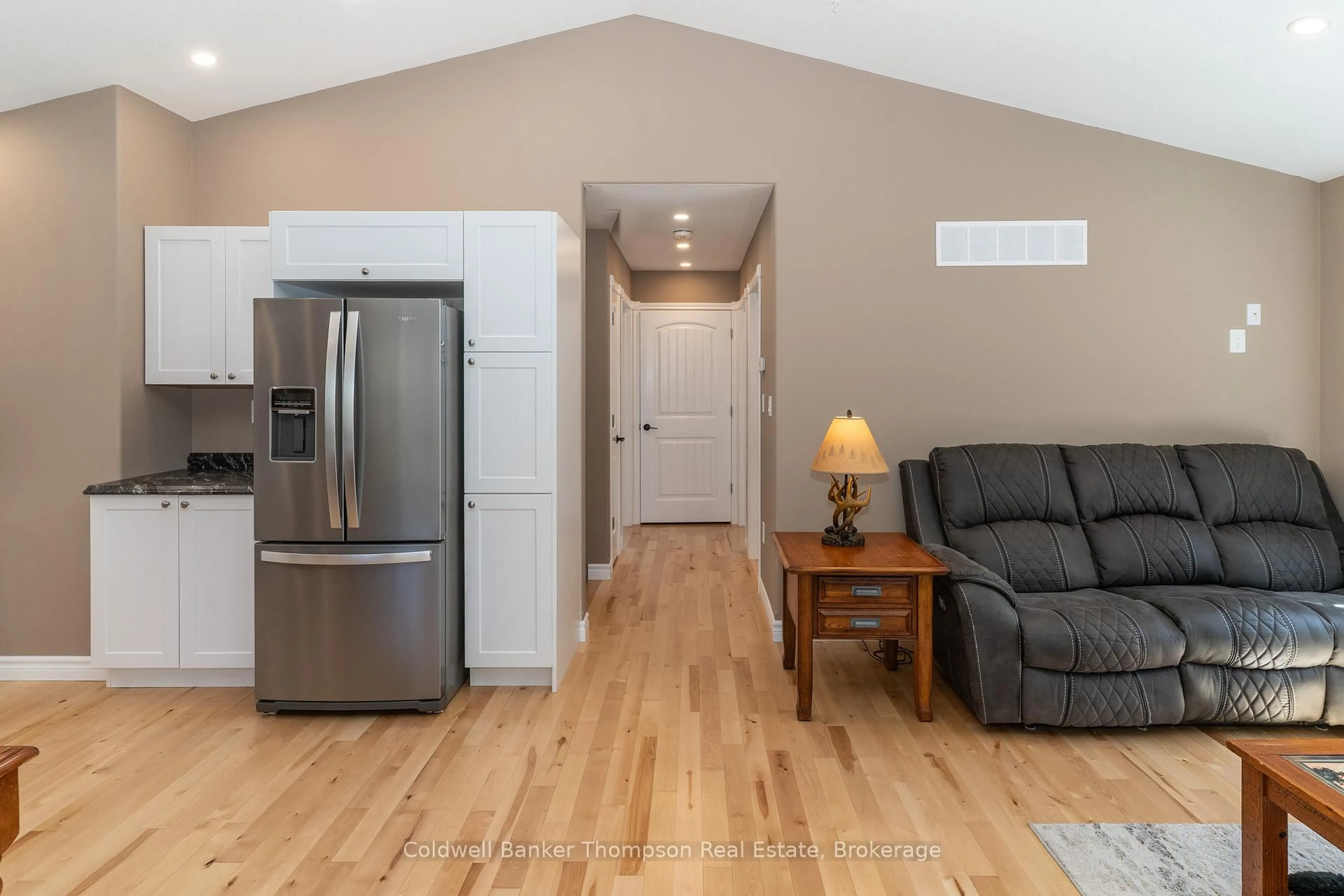 Living room with furniture, wood/laminate floor for 234 Main St, Burk's Falls Ontario P0A 1C0