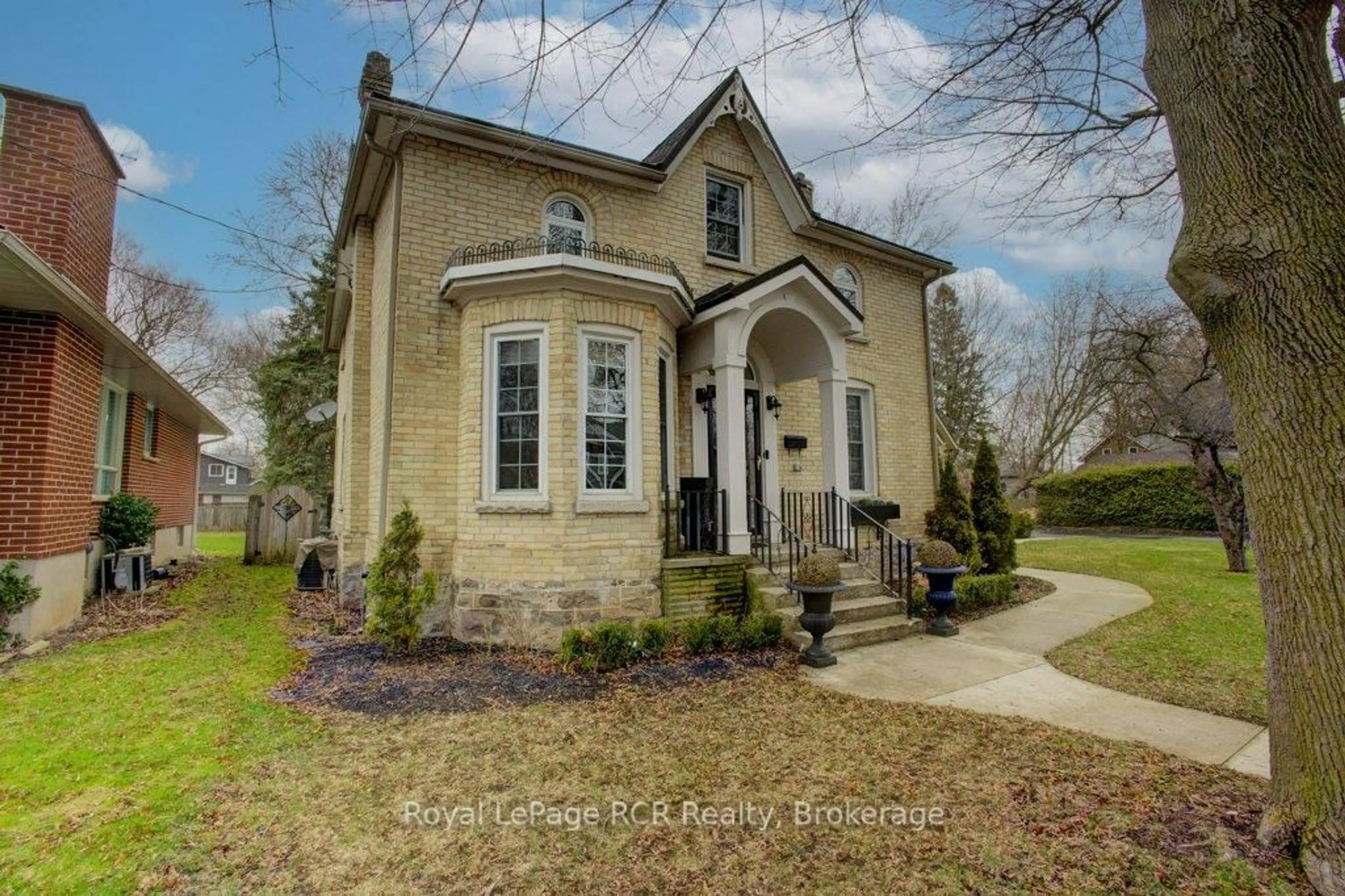 Home with brick exterior material, building for 116 Walton St, Wellington North Ontario N0G 1A0