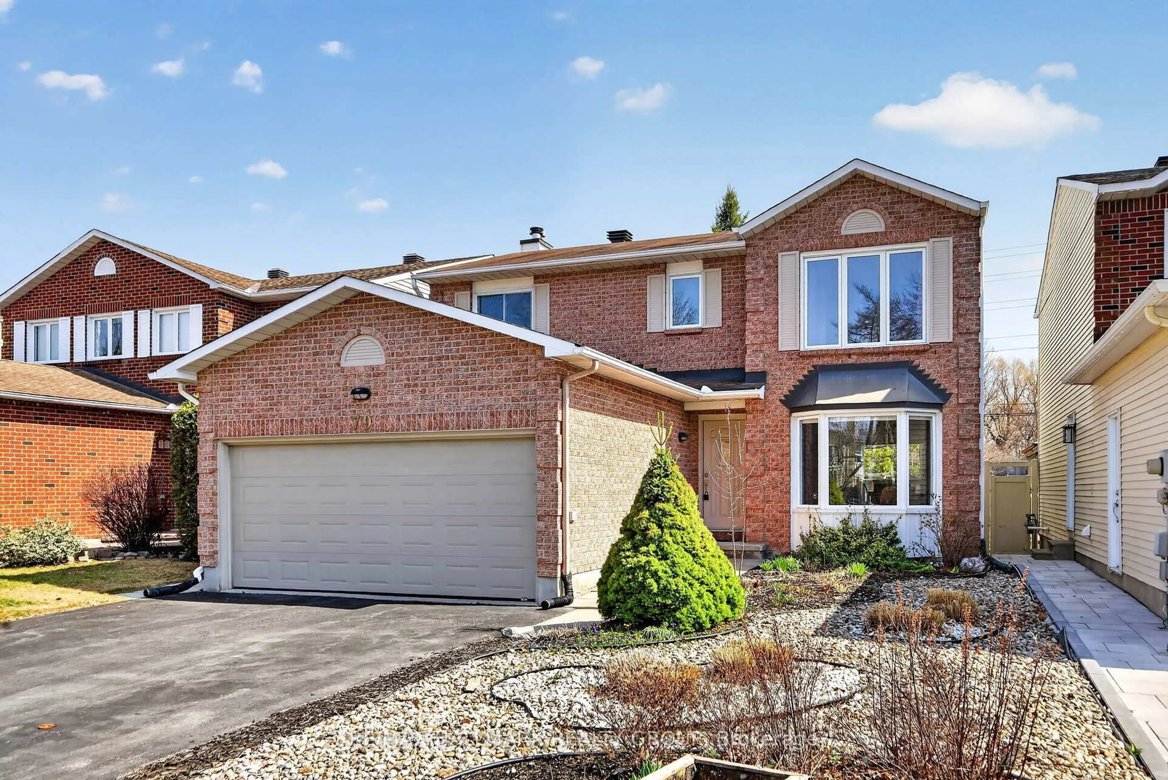 Home with brick exterior material, street for 79 Dossetter Way, Ottawa Ontario K1G 4S7