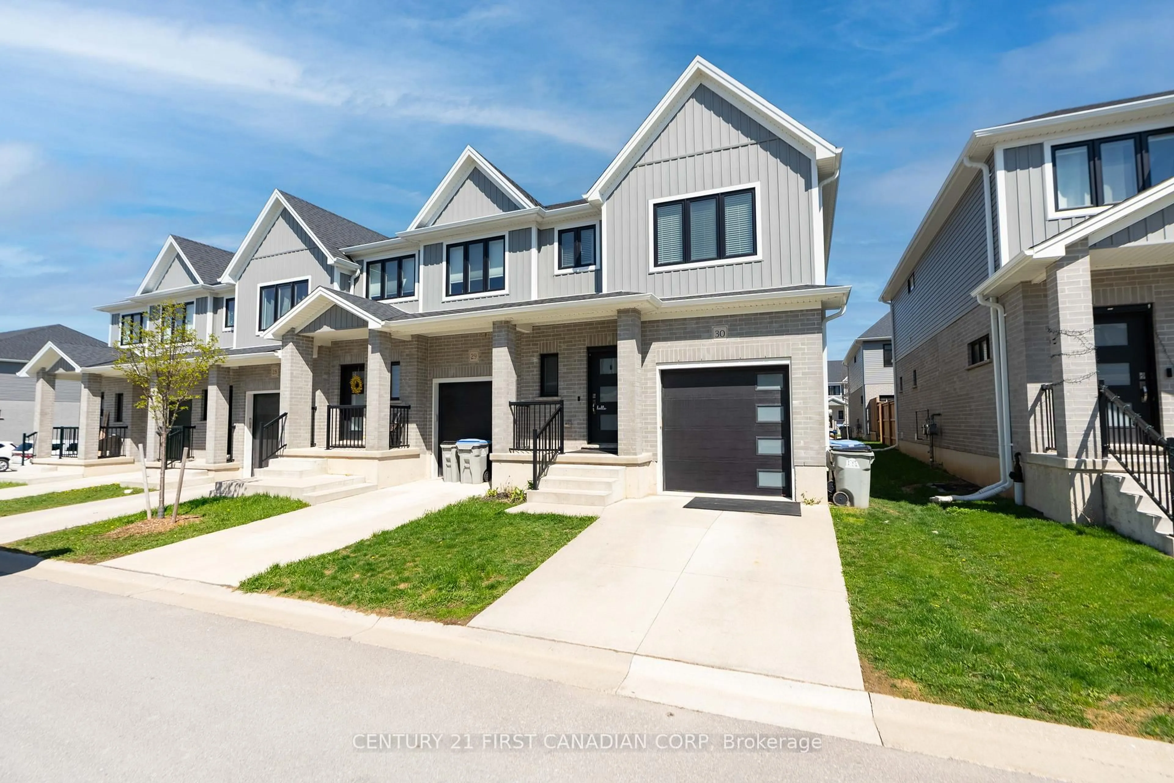 Home with vinyl exterior material, street for 1-30 Miller Dr, Lucan Biddulph Ontario N0M 2J0