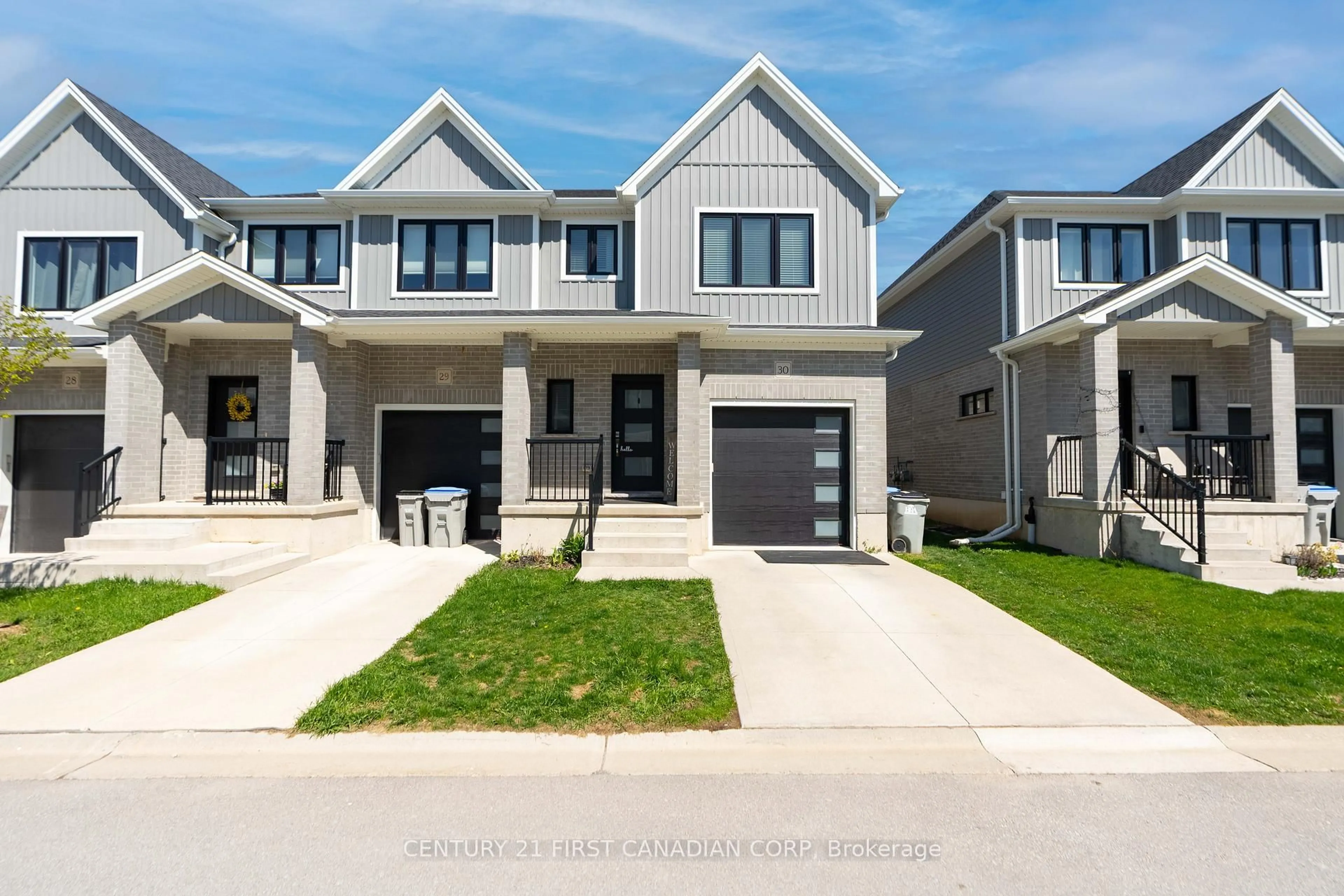 Home with vinyl exterior material, street for 1-30 Miller Dr, Lucan Biddulph Ontario N0M 2J0