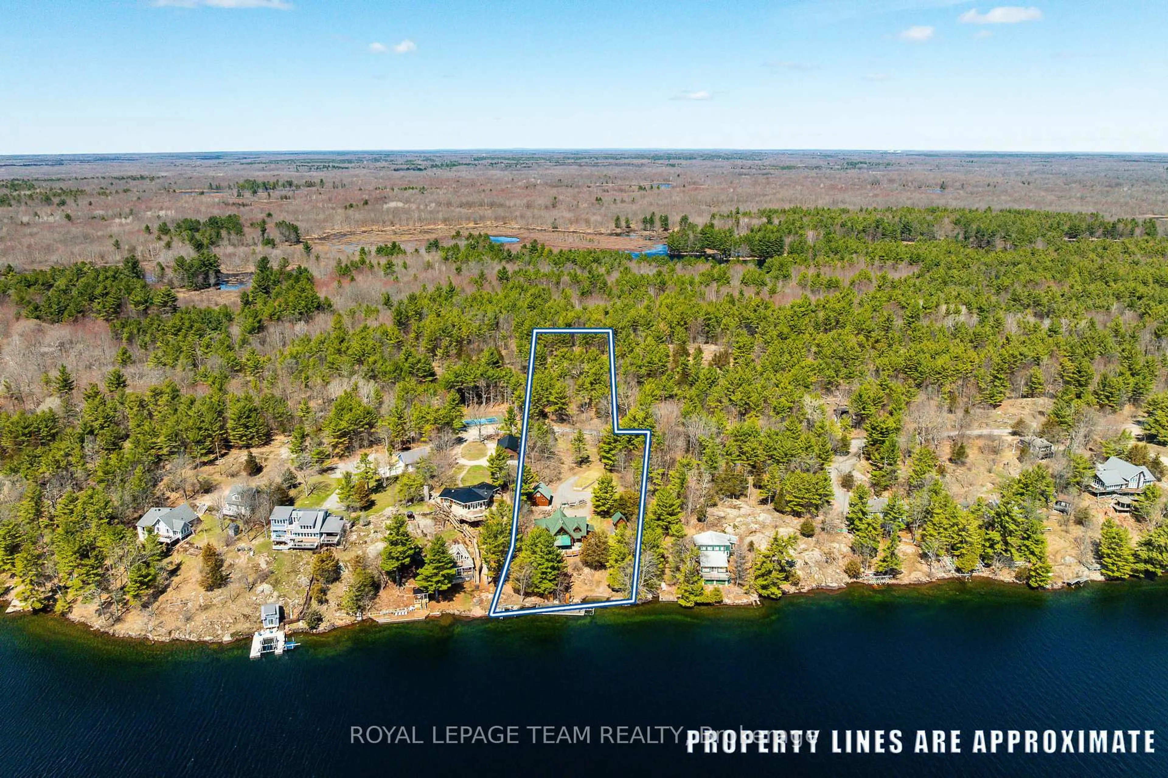 A pic from outside/outdoor area/front of a property/back of a property/a pic from drone, water/lake/river/ocean view for 781 Big Rideau North Shore Rd, Perth Ontario K7H 3C5