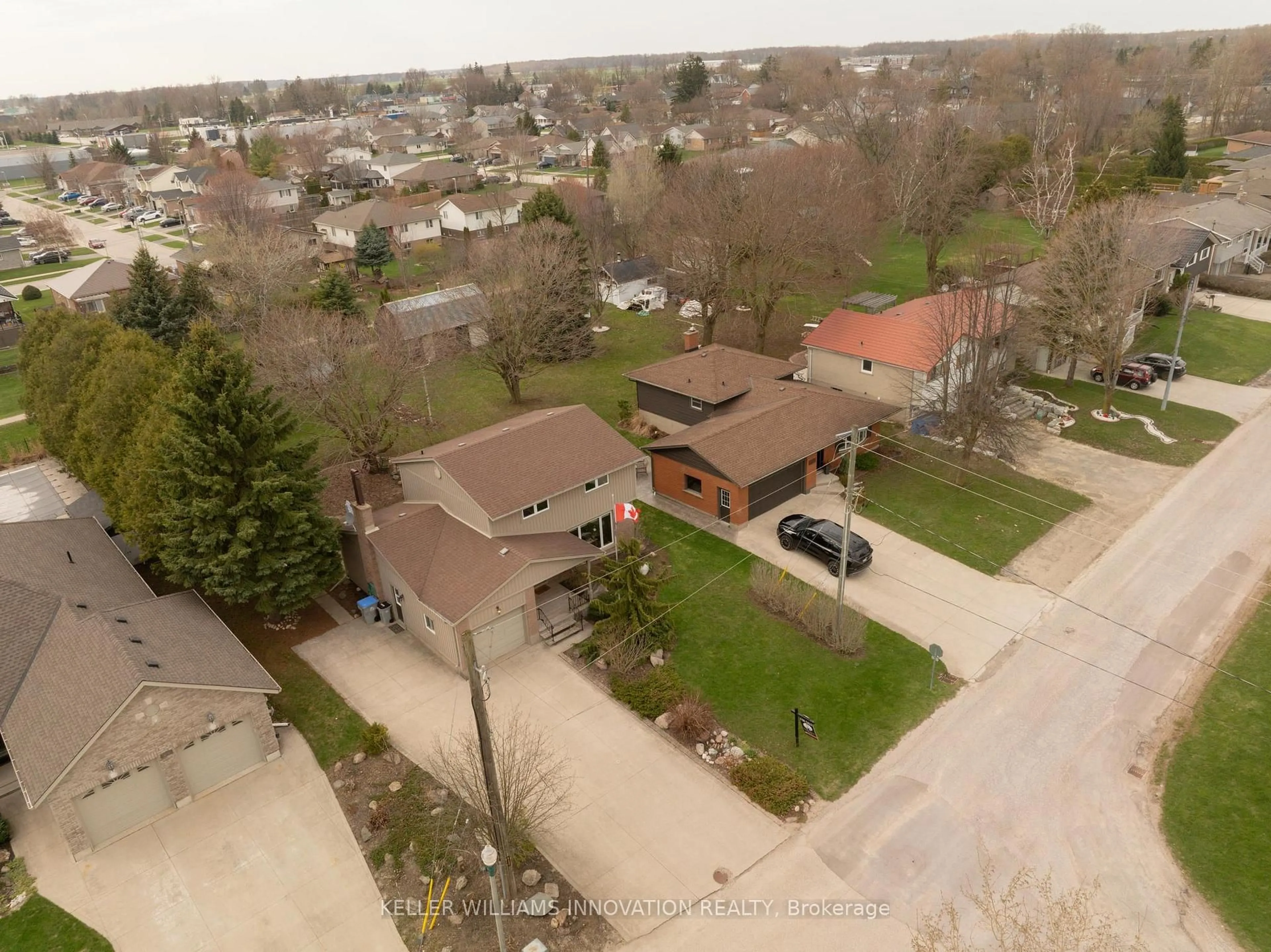 A pic from outside/outdoor area/front of a property/back of a property/a pic from drone, street for 465 Boyne Ave, North Perth Ontario N4W 3K5