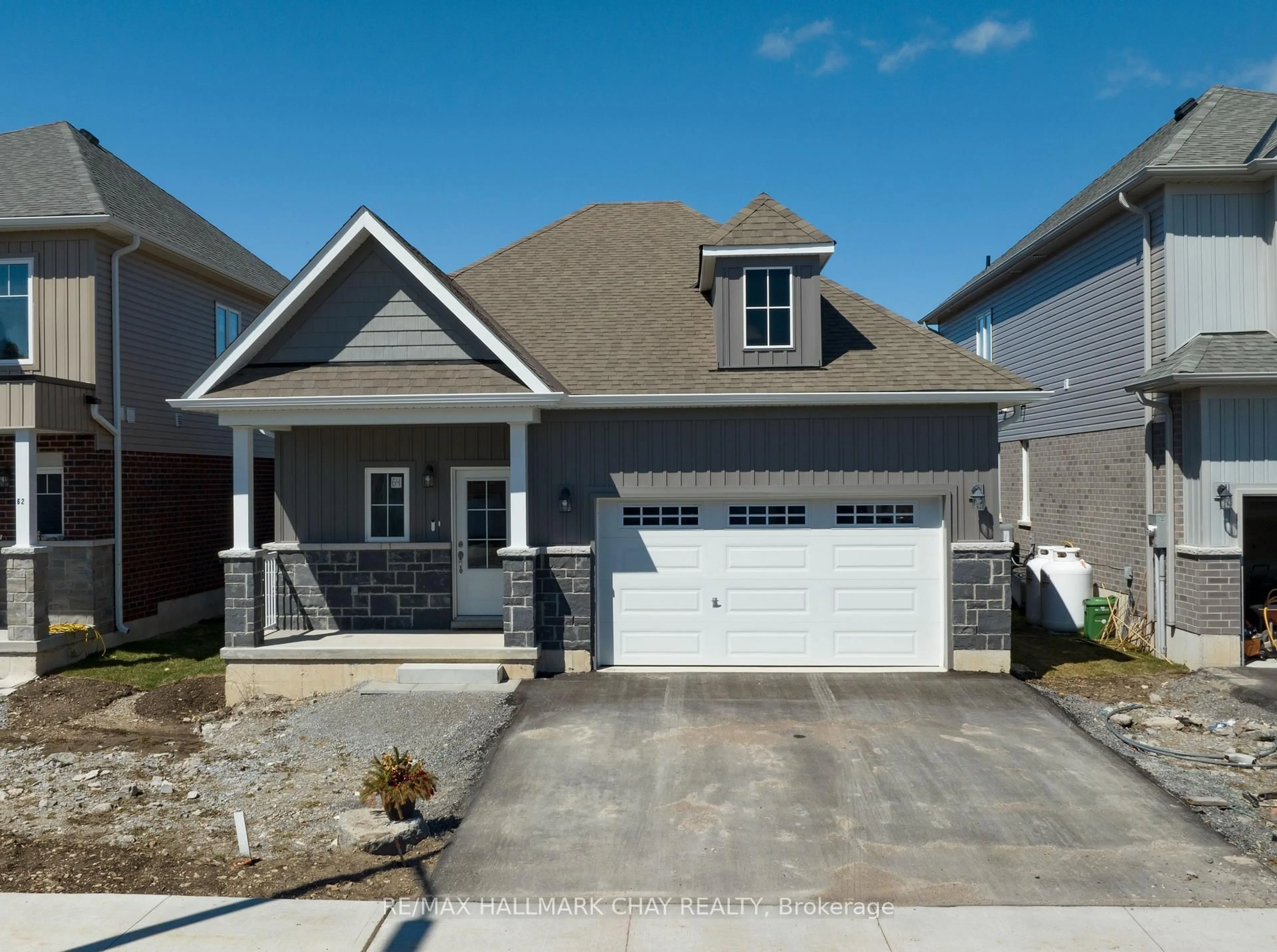 Home with vinyl exterior material, street for 64 Hillcroft Way, Kawartha Lakes Ontario K0M 1A0