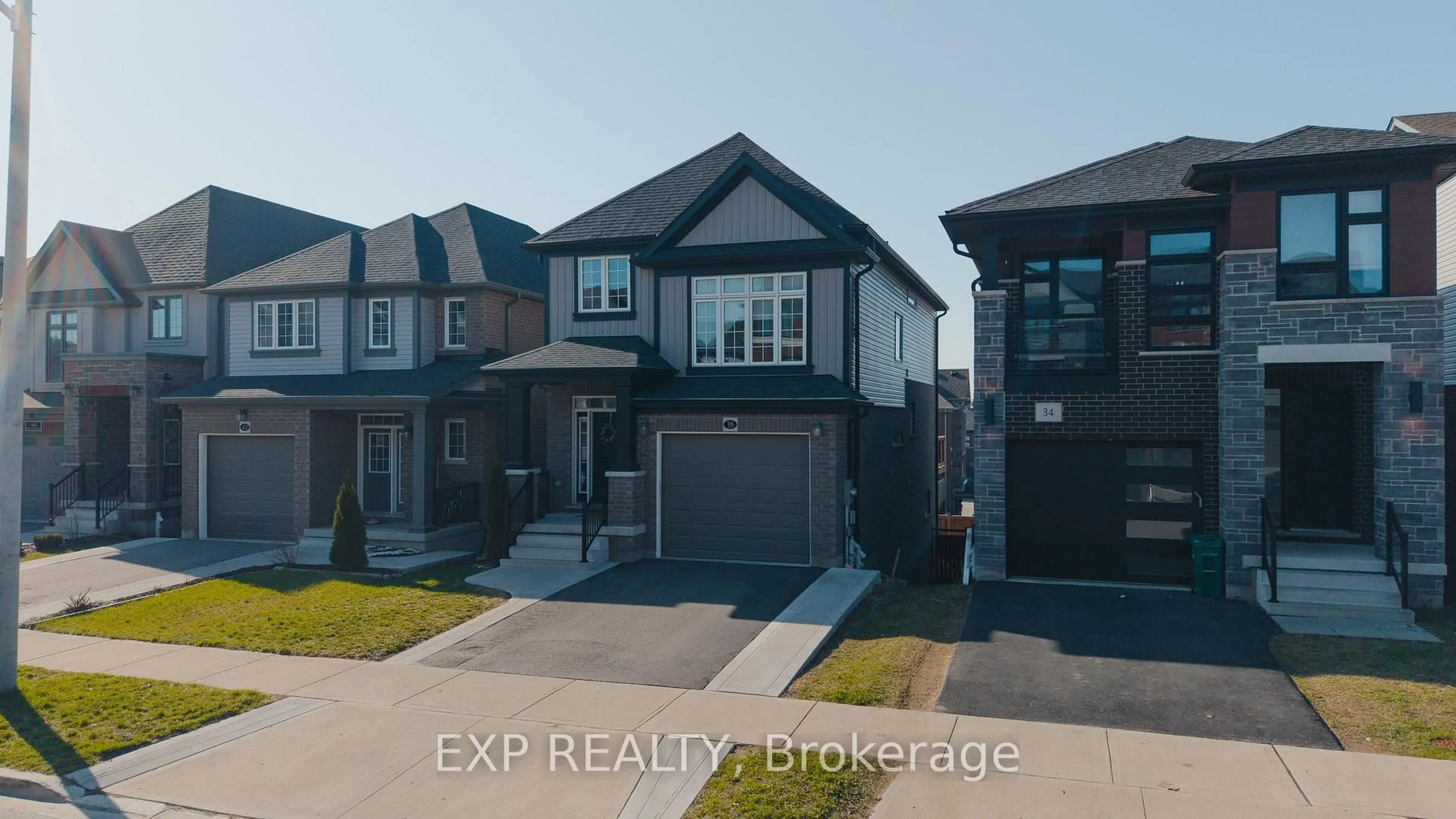 A pic from outside/outdoor area/front of a property/back of a property/a pic from drone, street for 38 SPORTSMAN HIL St, Kitchener Ontario N2H 5T3