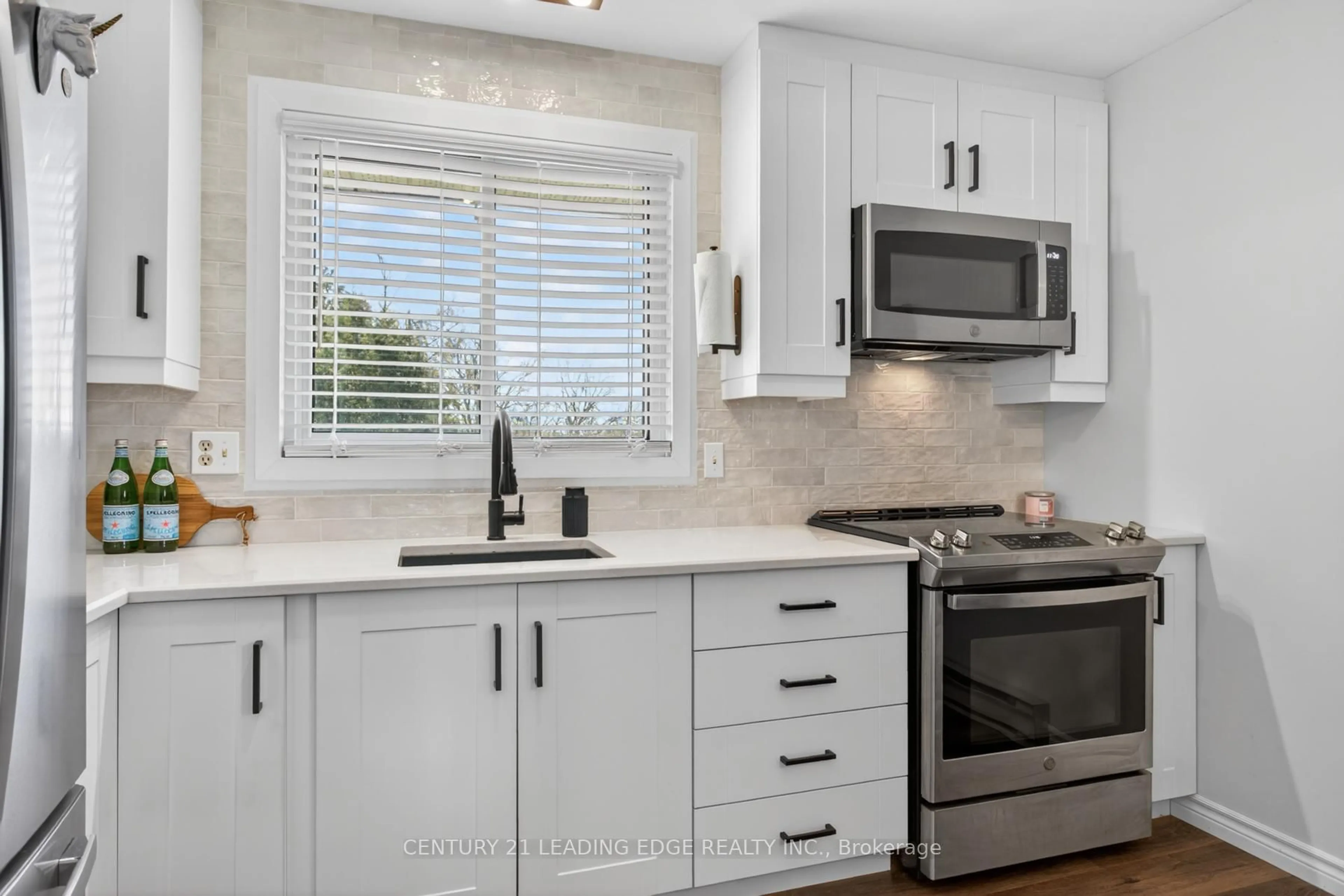 Open concept kitchen, ceramic/tile floor for 107 Rita Cres #A, Kawartha Lakes Ontario K0L 2W0