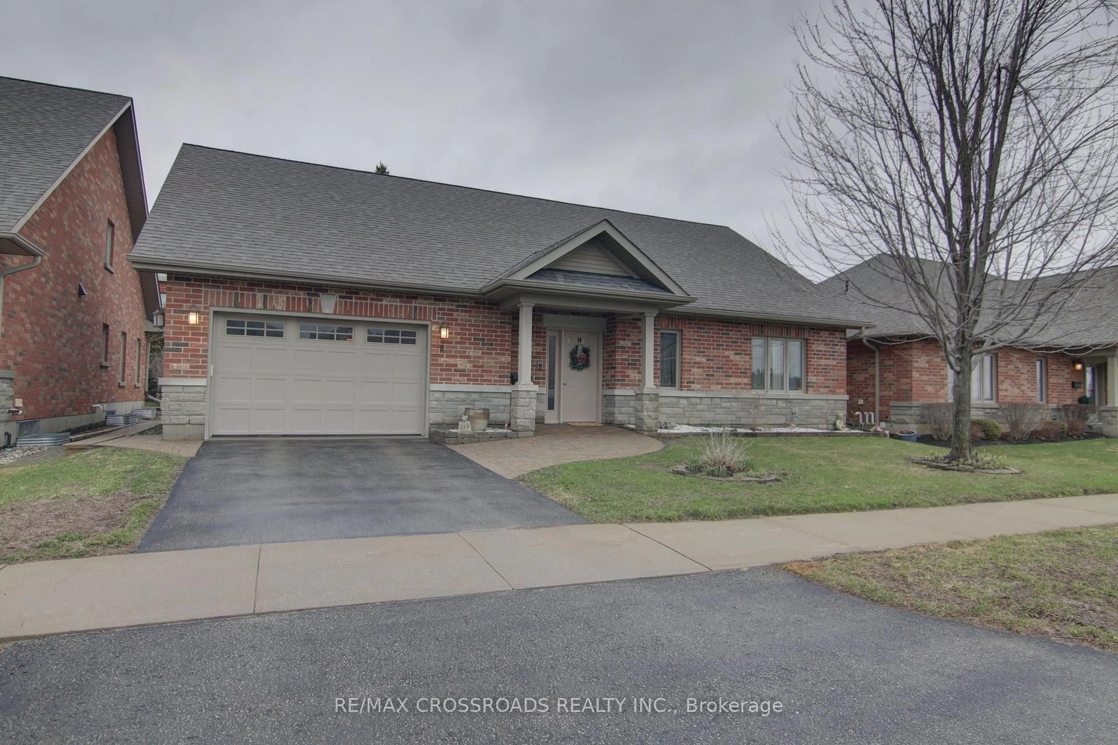 Home with brick exterior material, street for 8 Green Arbour Way, Kawartha Lakes Ontario K9V 0E6