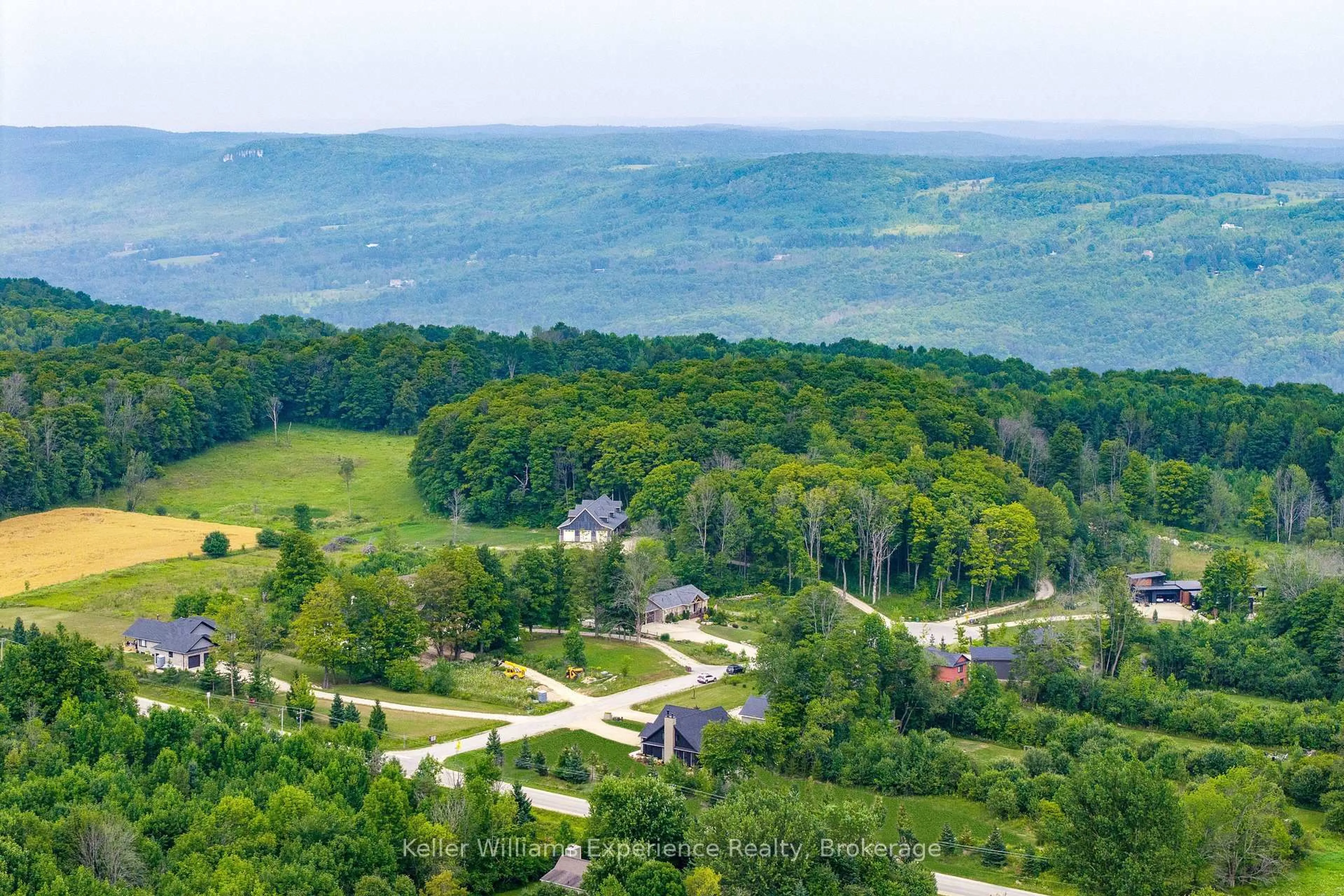 A pic from outside/outdoor area/front of a property/back of a property/a pic from drone, forest/trees view for 104 Butternut Crt, Grey Highlands Ontario N0C 1H0