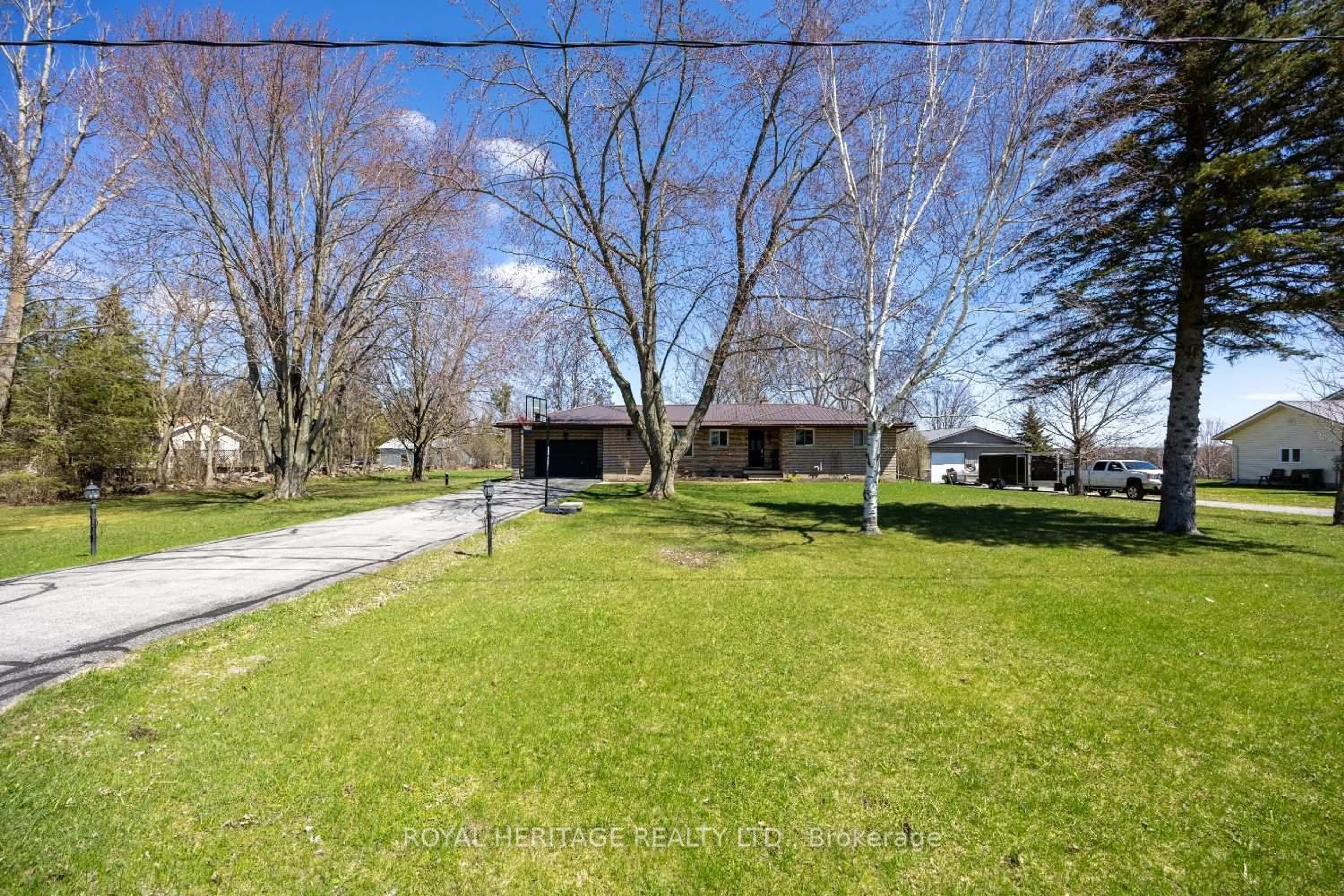 A pic from outside/outdoor area/front of a property/back of a property/a pic from drone, street for 116 Beach Rd, Kawartha Lakes Ontario K0M 2C0