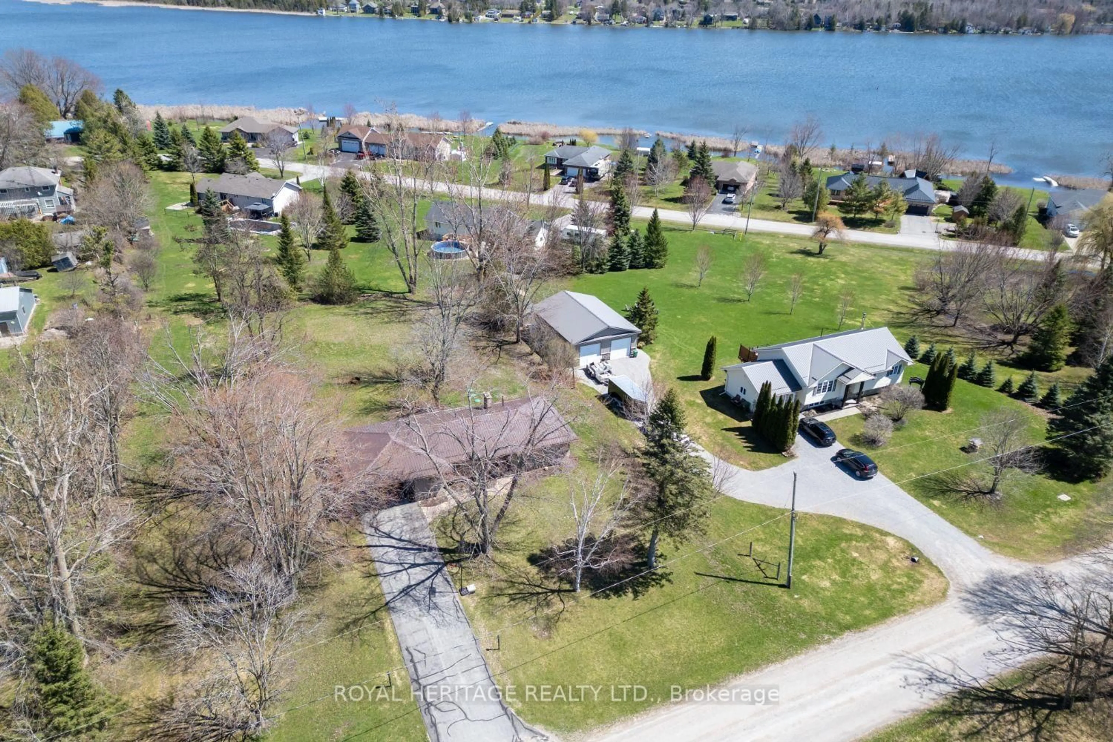 A pic from outside/outdoor area/front of a property/back of a property/a pic from drone, water/lake/river/ocean view for 116 Beach Rd, Kawartha Lakes Ontario K0M 2C0