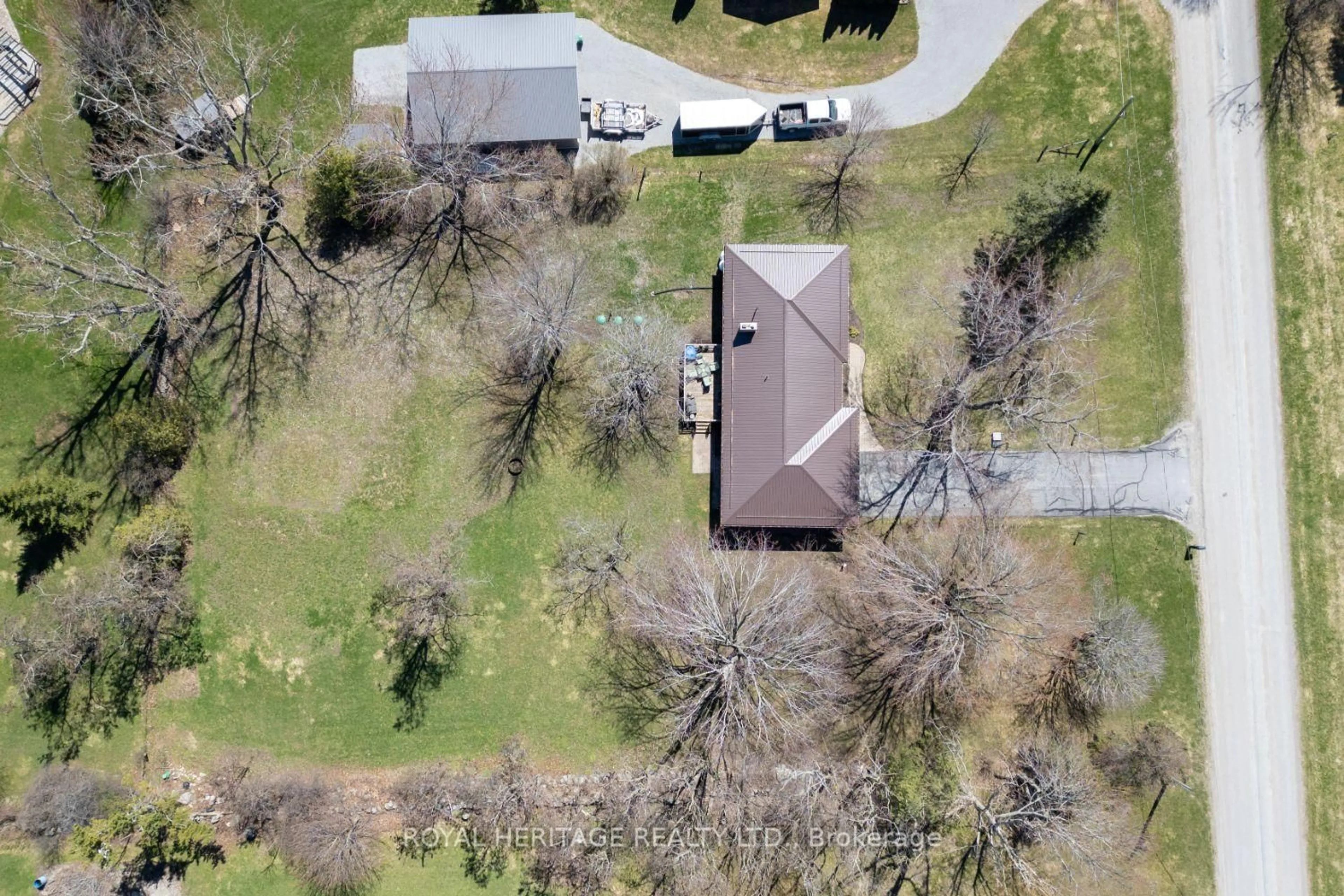 A pic from outside/outdoor area/front of a property/back of a property/a pic from drone, street for 116 Beach Rd, Kawartha Lakes Ontario K0M 2C0