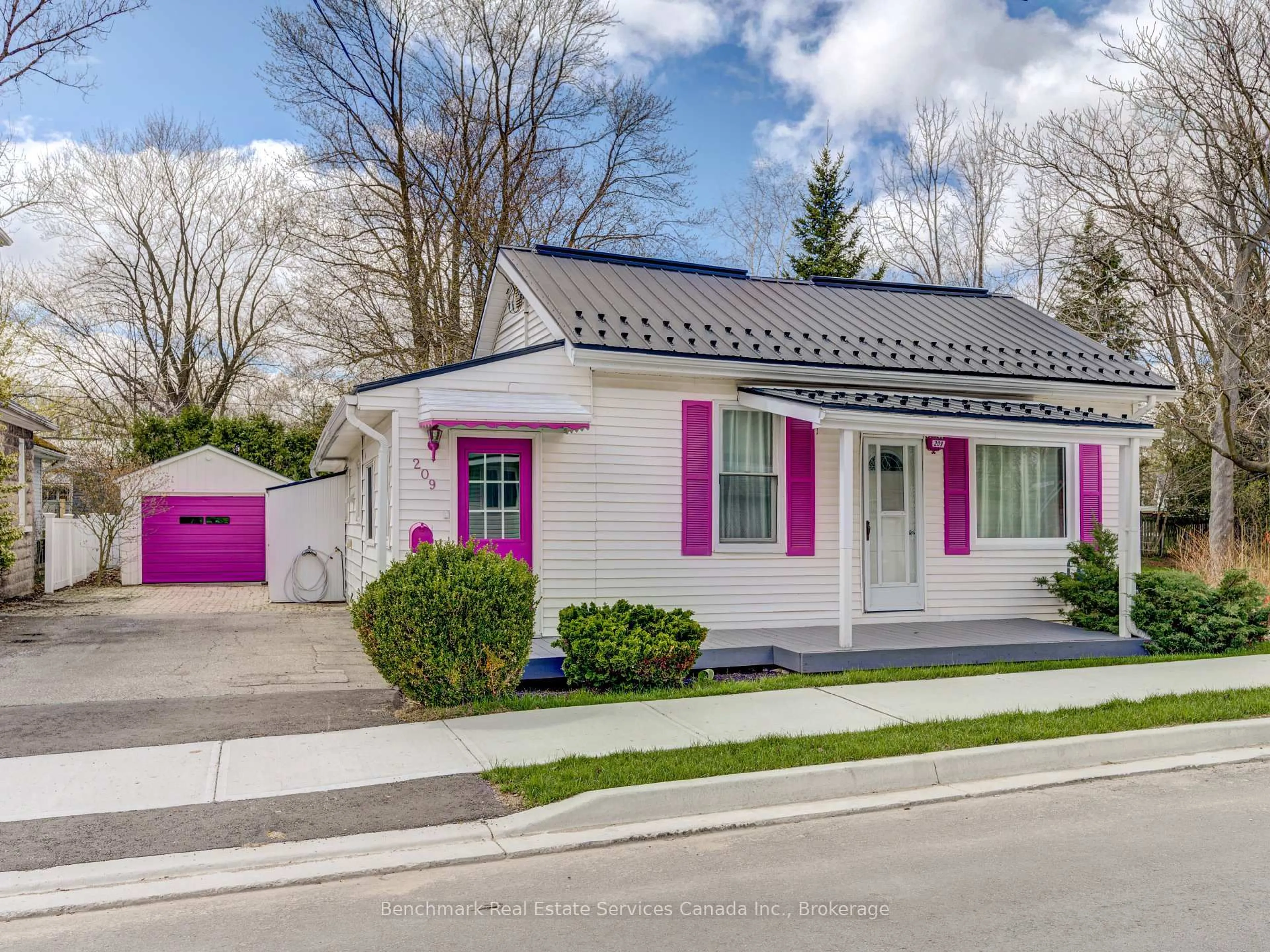 Home with vinyl exterior material, street for 209 Water St, Lucan Biddulph Ontario N0M 2J0