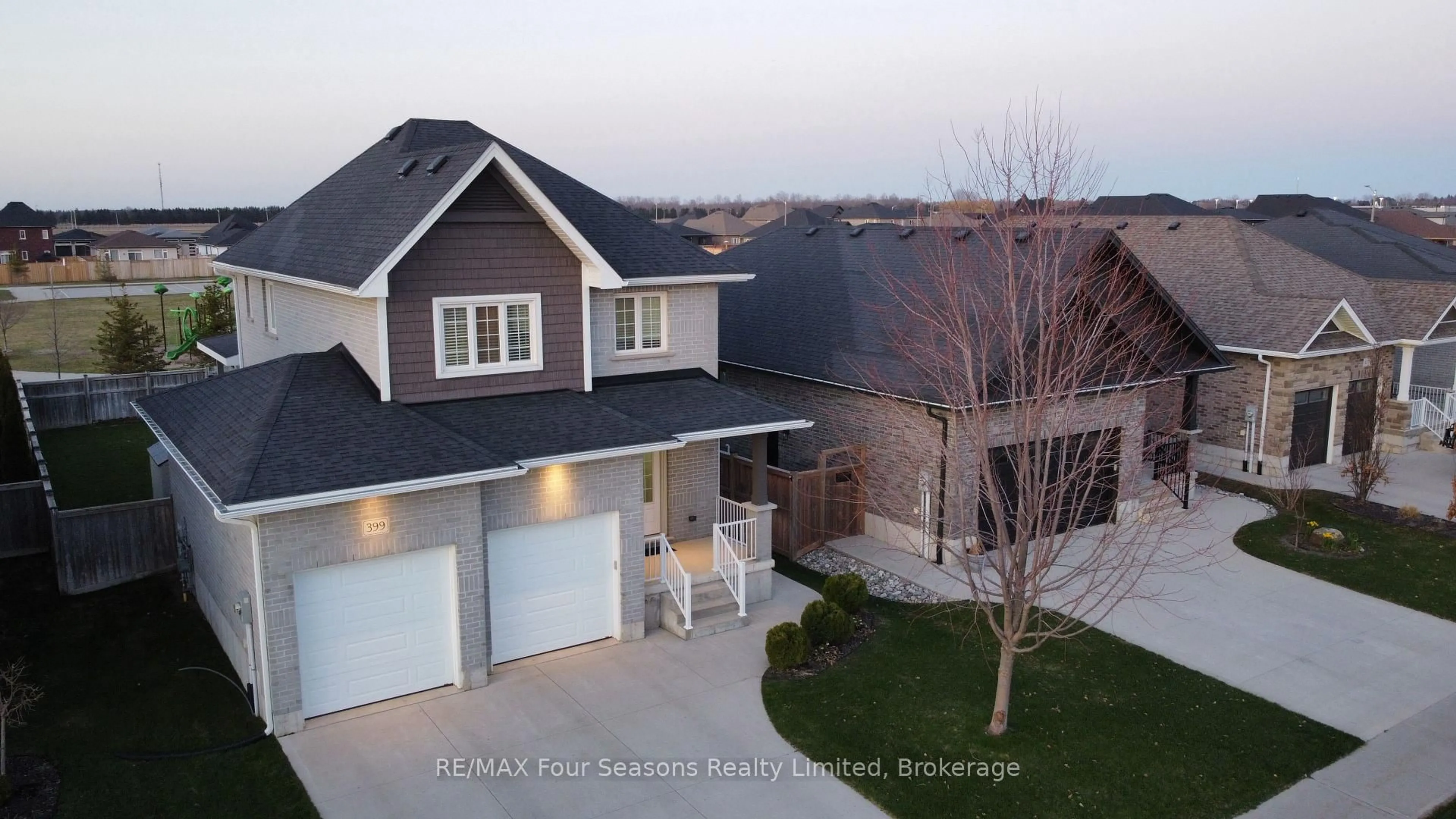 A pic from outside/outdoor area/front of a property/back of a property/a pic from drone, street for 399 Devonshire Rd, Saugeen Shores Ontario N0H 2C6