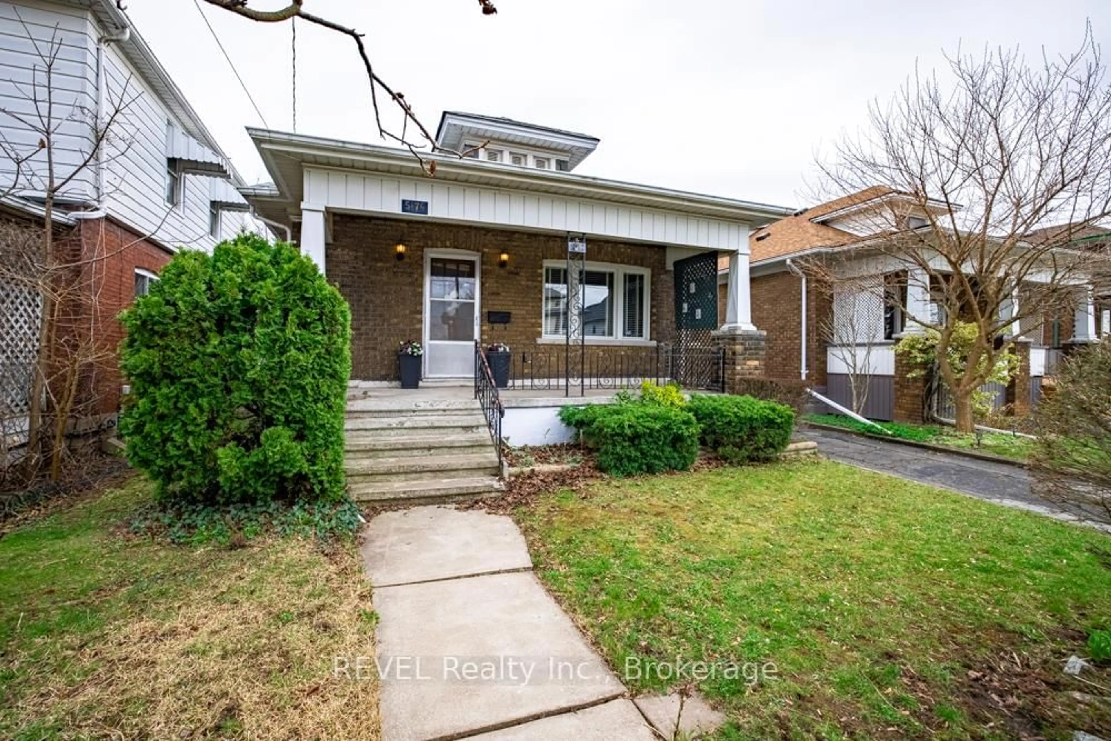 Home with brick exterior material, street for 5176 Willmott St, Niagara Falls Ontario L2E 2A5