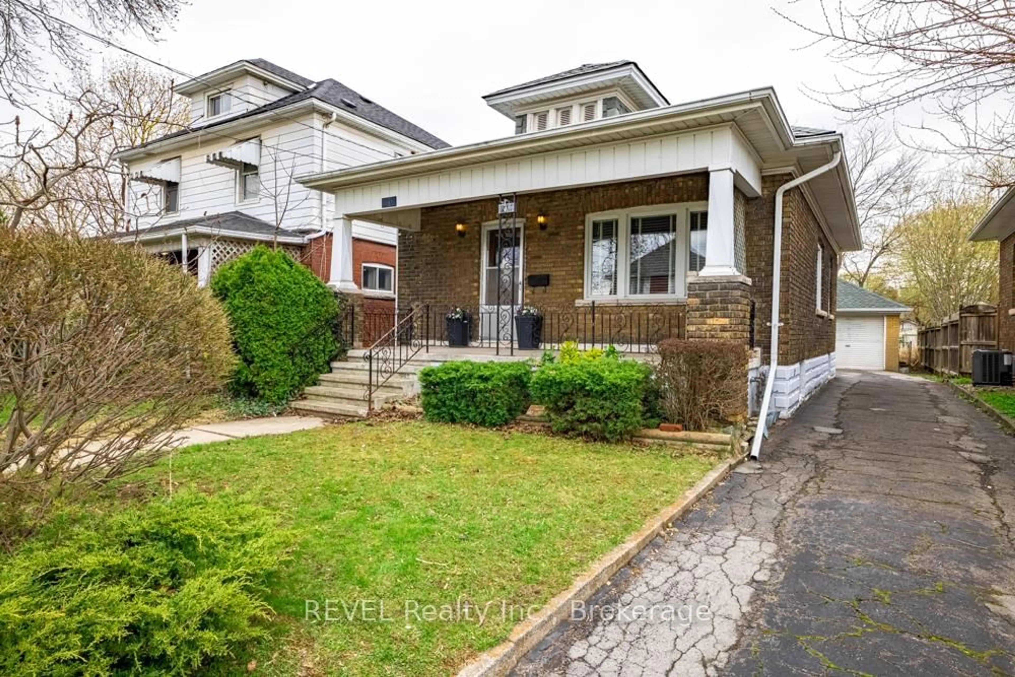 Home with brick exterior material, street for 5176 Willmott St, Niagara Falls Ontario L2E 2A5