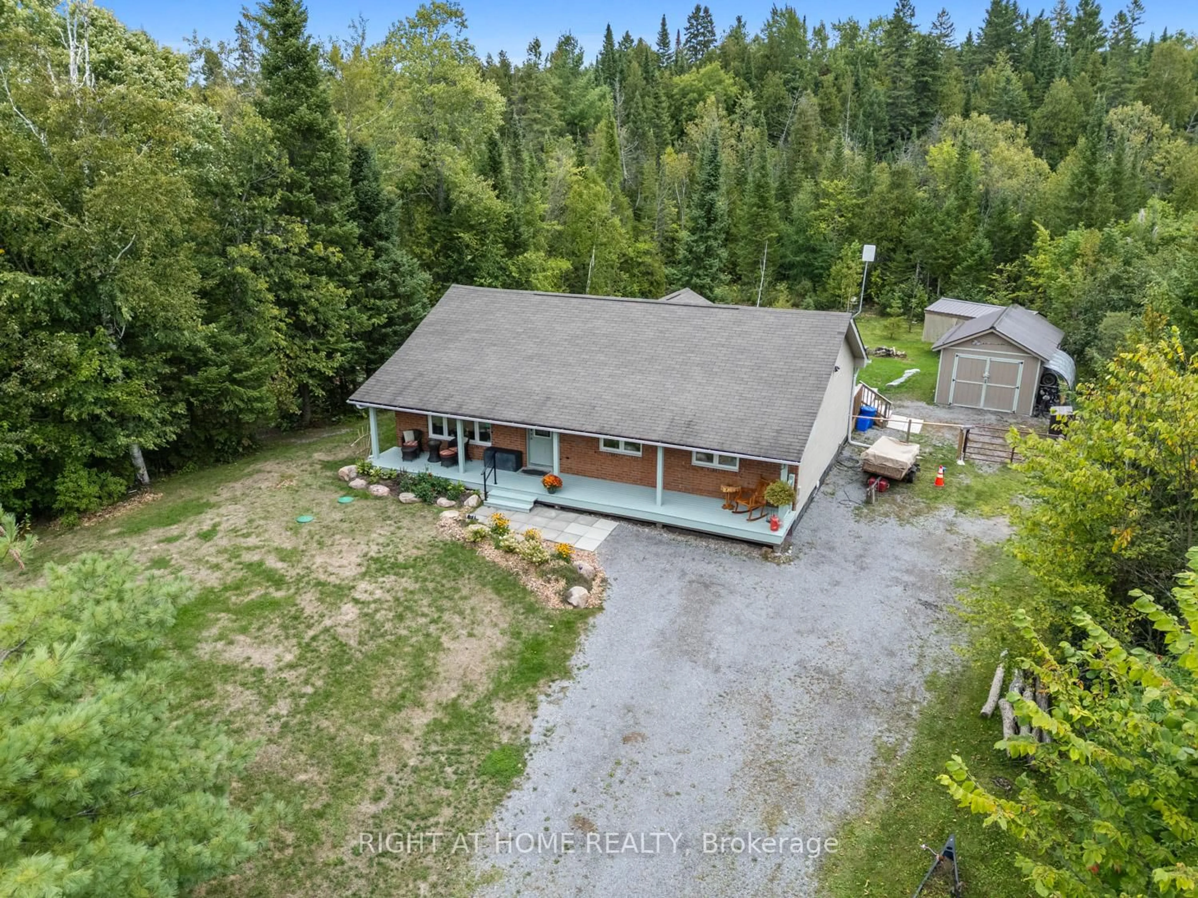 A pic from outside/outdoor area/front of a property/back of a property/a pic from drone, unknown for 89 River Rd, Kawartha Lakes Ontario K0M 1N0