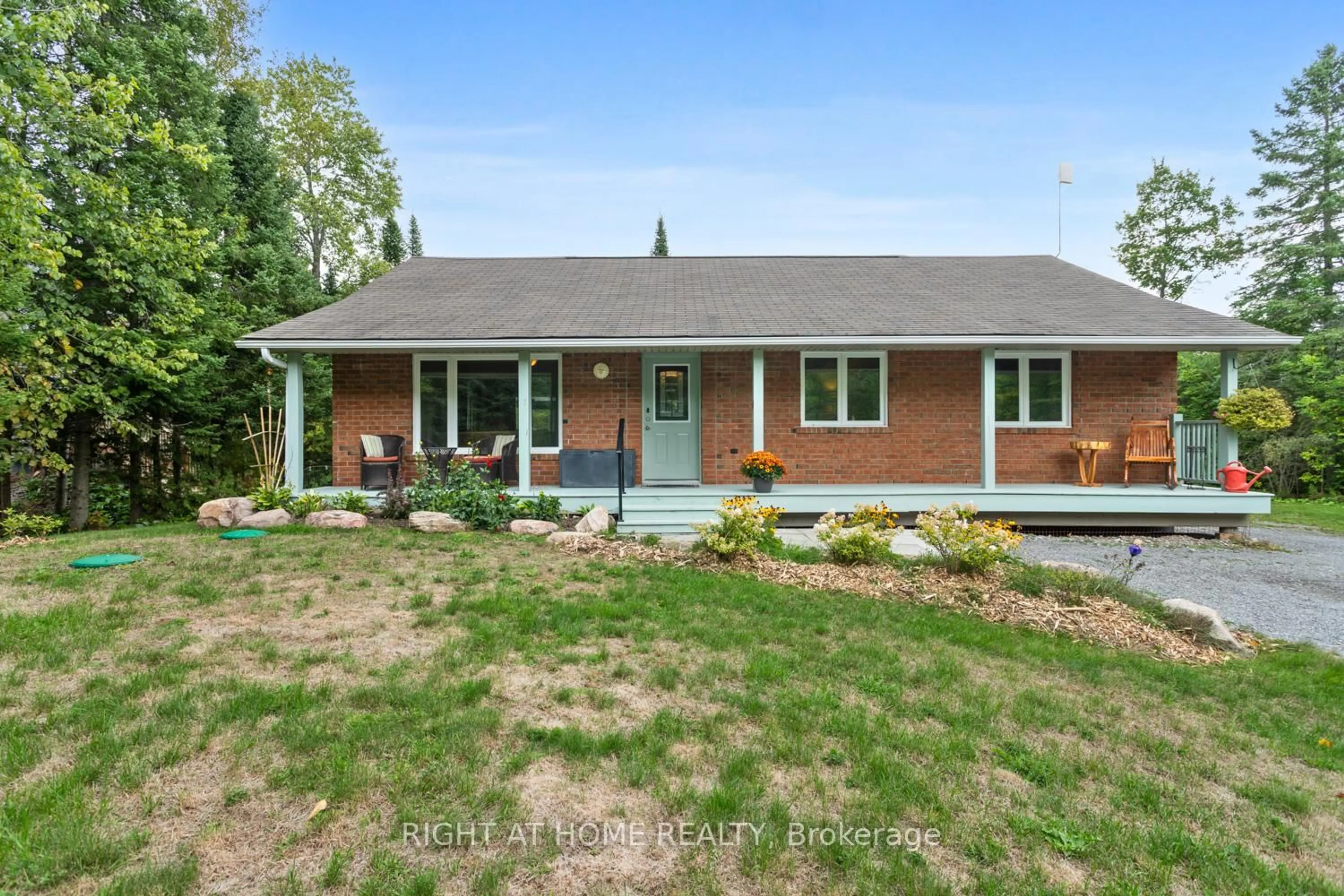 Home with brick exterior material, street for 89 River Rd, Kawartha Lakes Ontario K0M 1N0